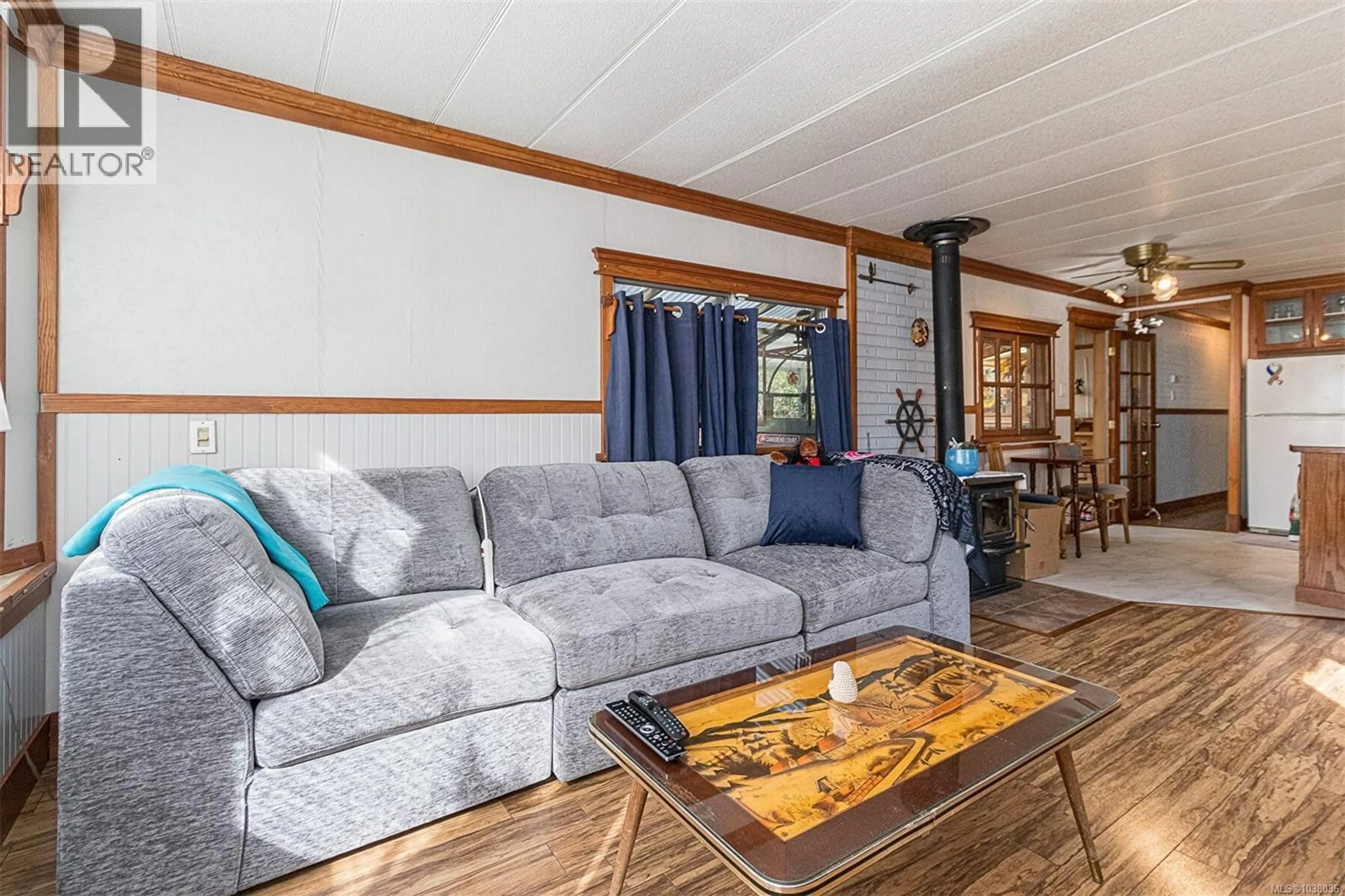 Living room with furniture, wood/laminate floor for 1 - 2780 SPENCER ROAD, Langford British Columbia V9B4C9