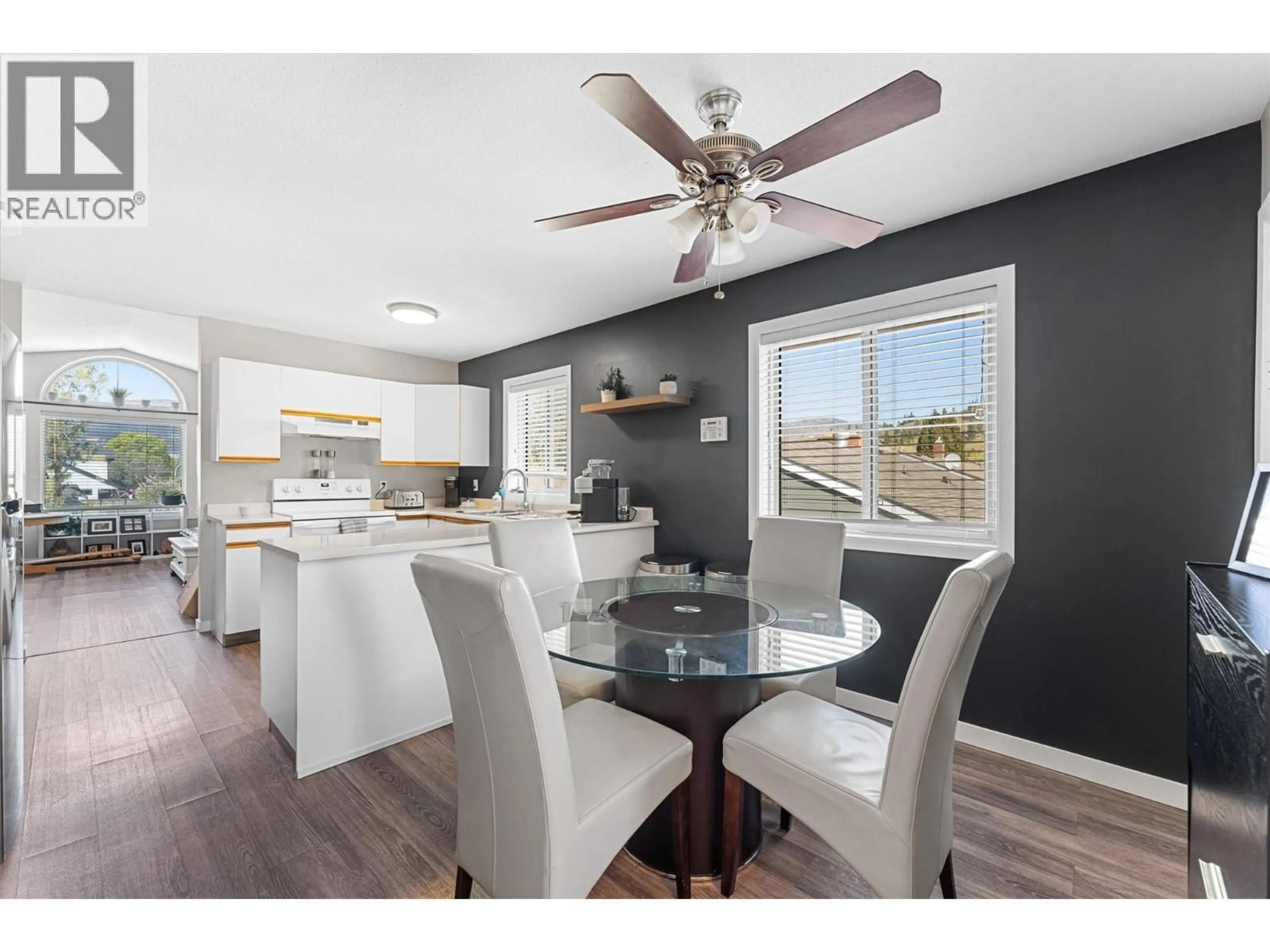 Open concept kitchen, wood/laminate floor for 859 RICHTER STREET, Kelowna British Columbia V1Y2J9