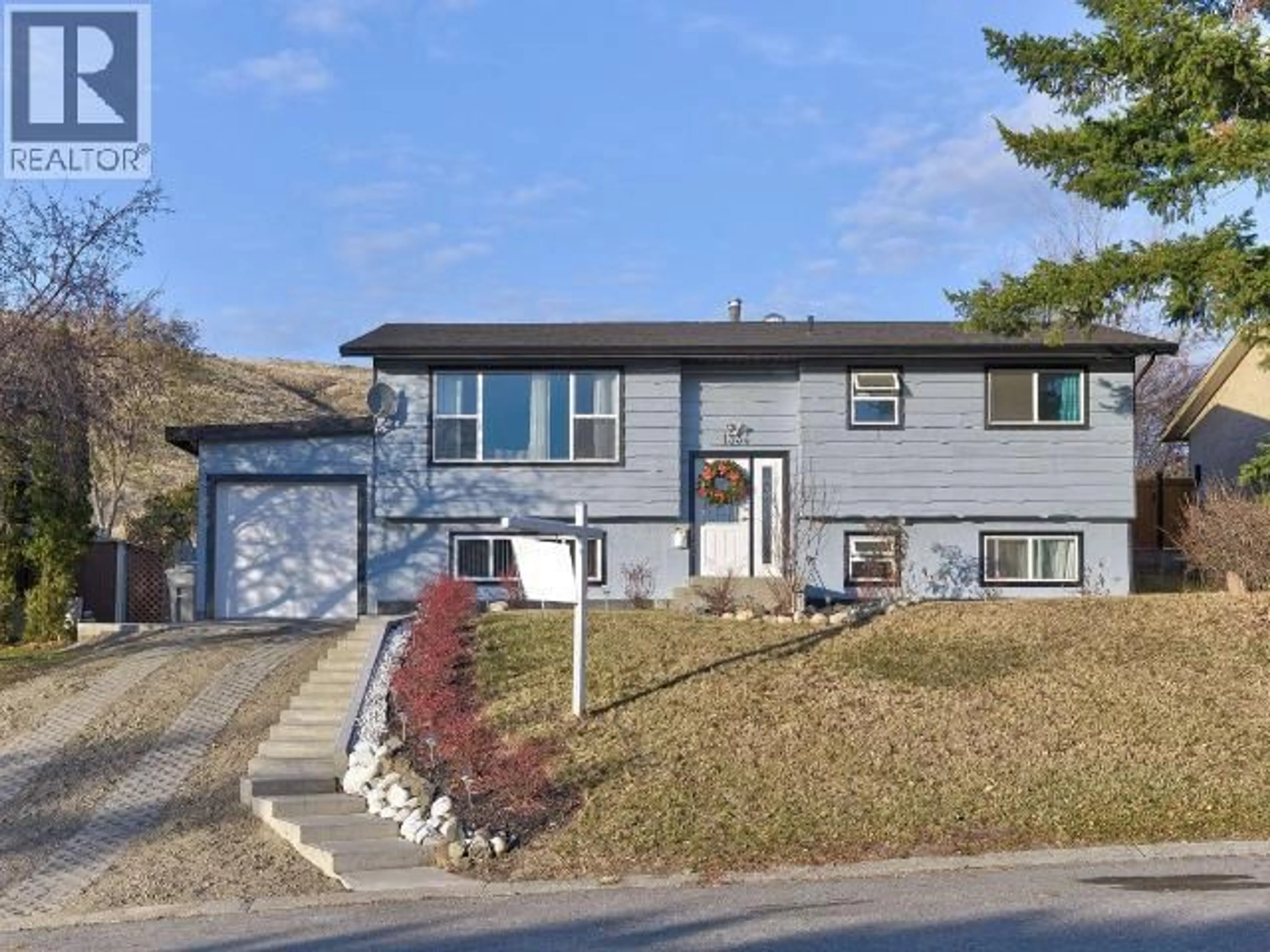 Home with vinyl exterior material, street for 1334 HOOK DRIVE, Kamloops British Columbia V2B7S9