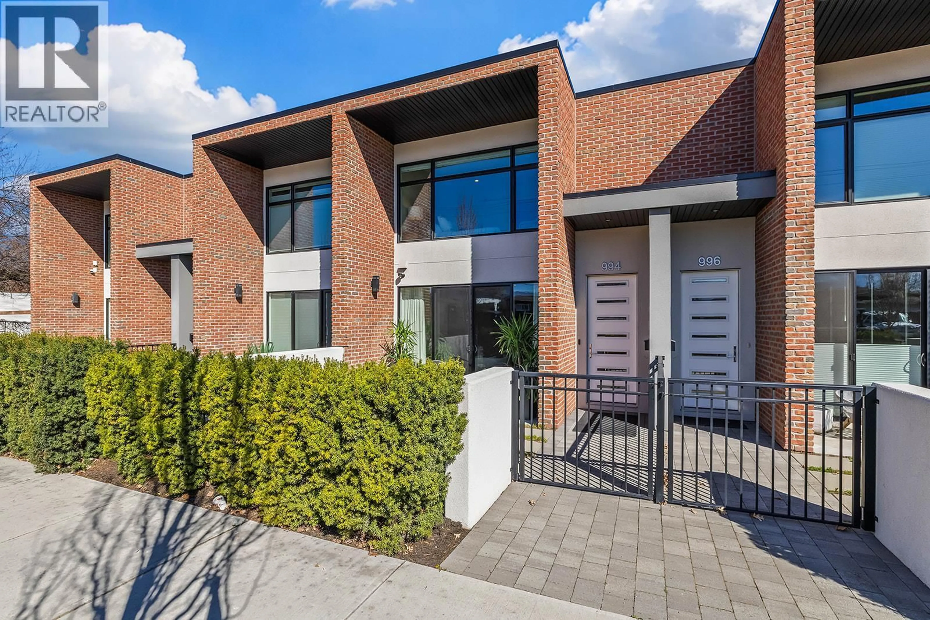 Home with brick exterior material, street for 994 GUISACHAN ROAD, Kelowna British Columbia V1Y9W8