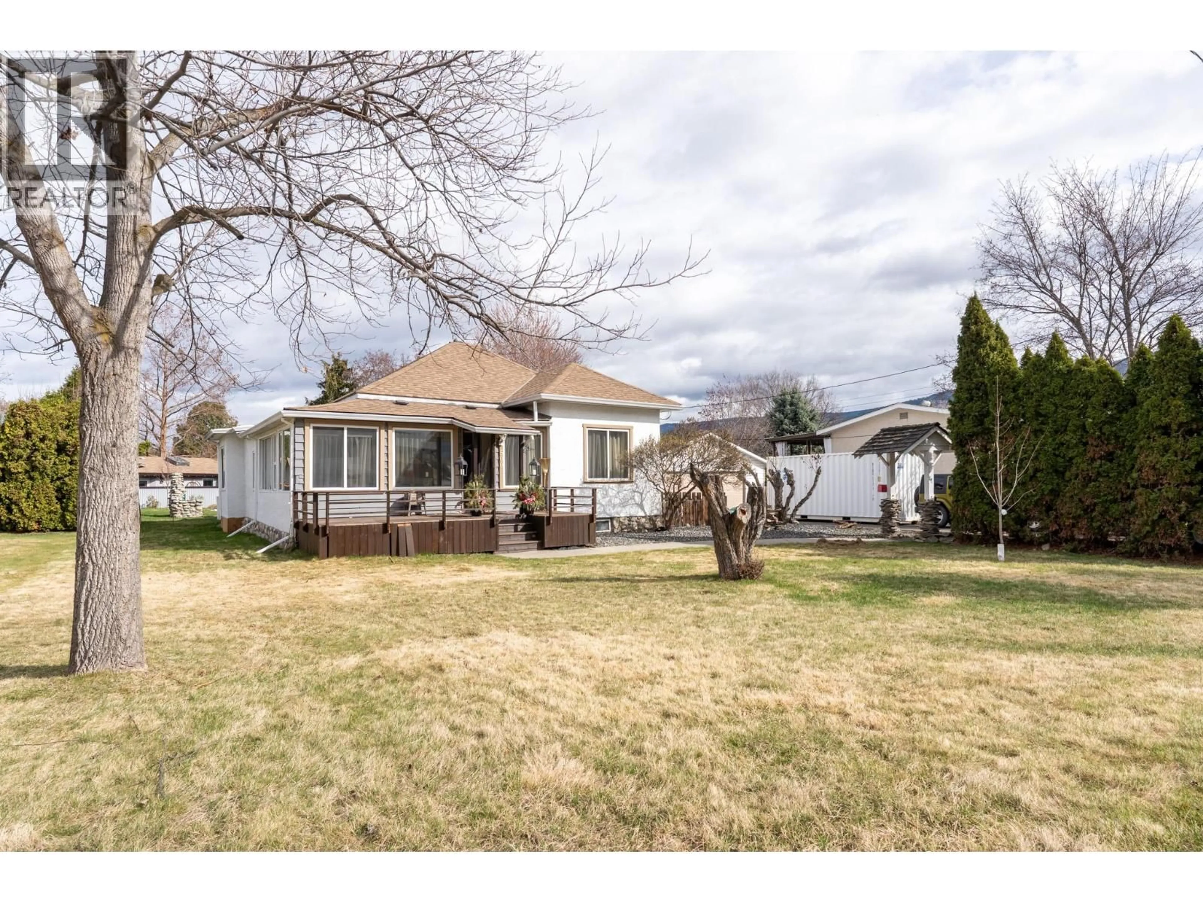 A pic from outside/outdoor area/front of a property/back of a property/a pic from drone, street for 500 MUGFORD ROAD, Kelowna British Columbia V1X2E7