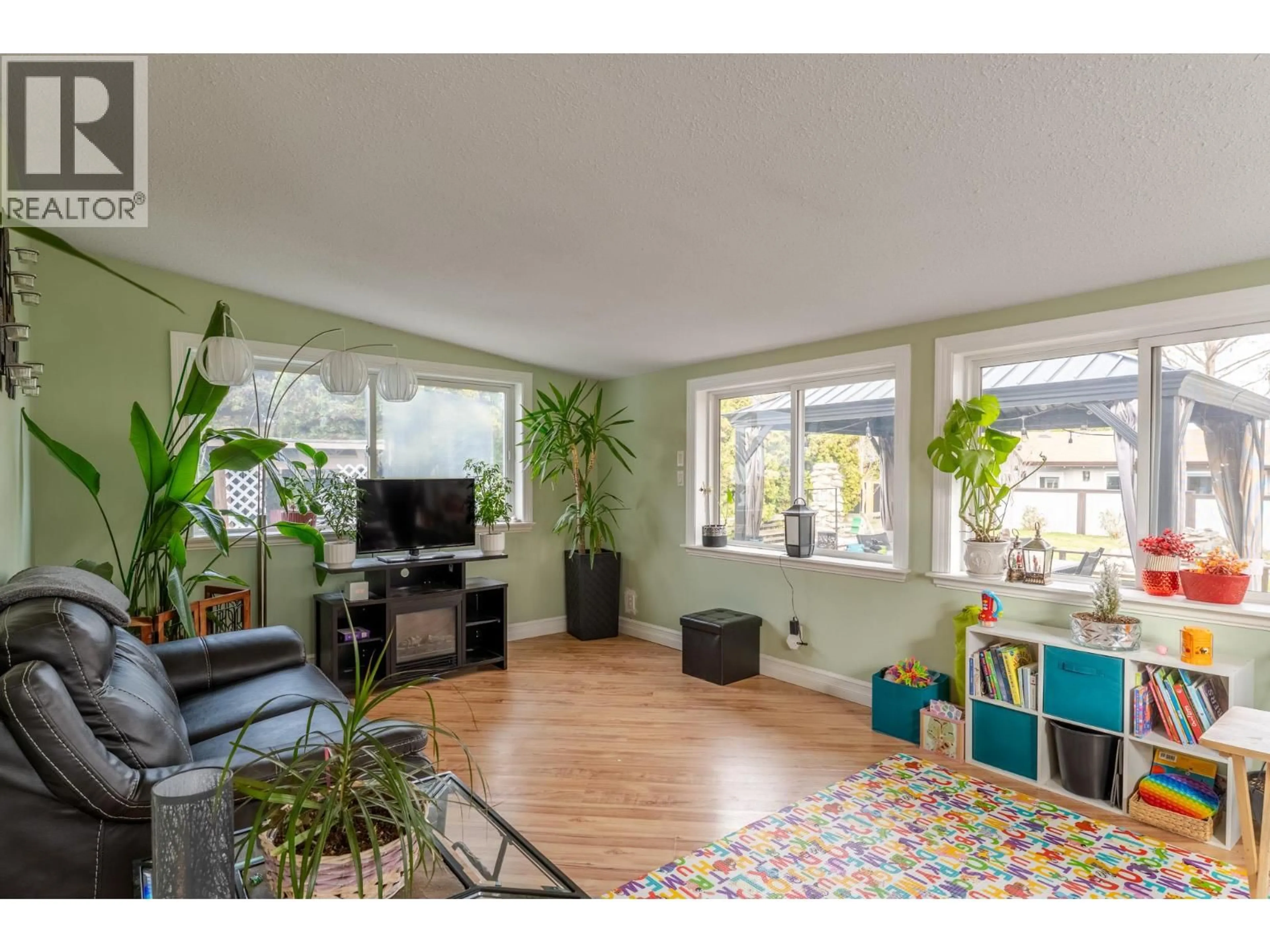 Living room with furniture, unknown for 500 MUGFORD ROAD, Kelowna British Columbia V1X2E7