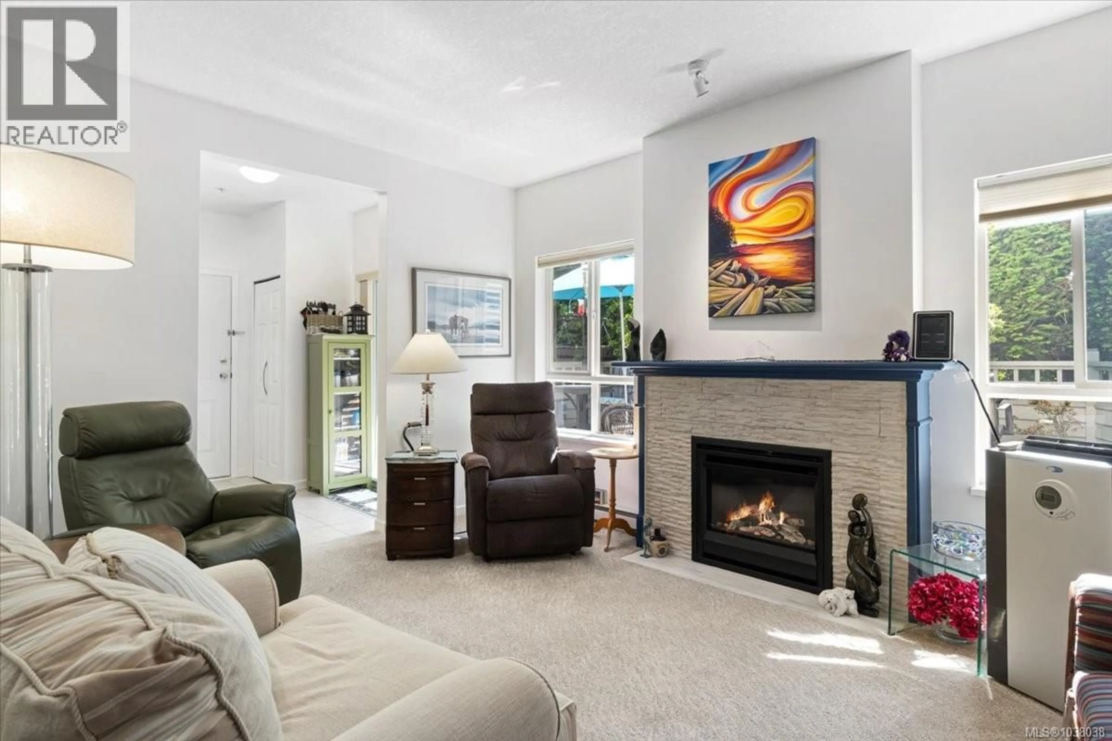 Living room with furniture, ceramic/tile floor for 105 - 5620 EDGEWATER LANE, Nanaimo British Columbia V9T6K1