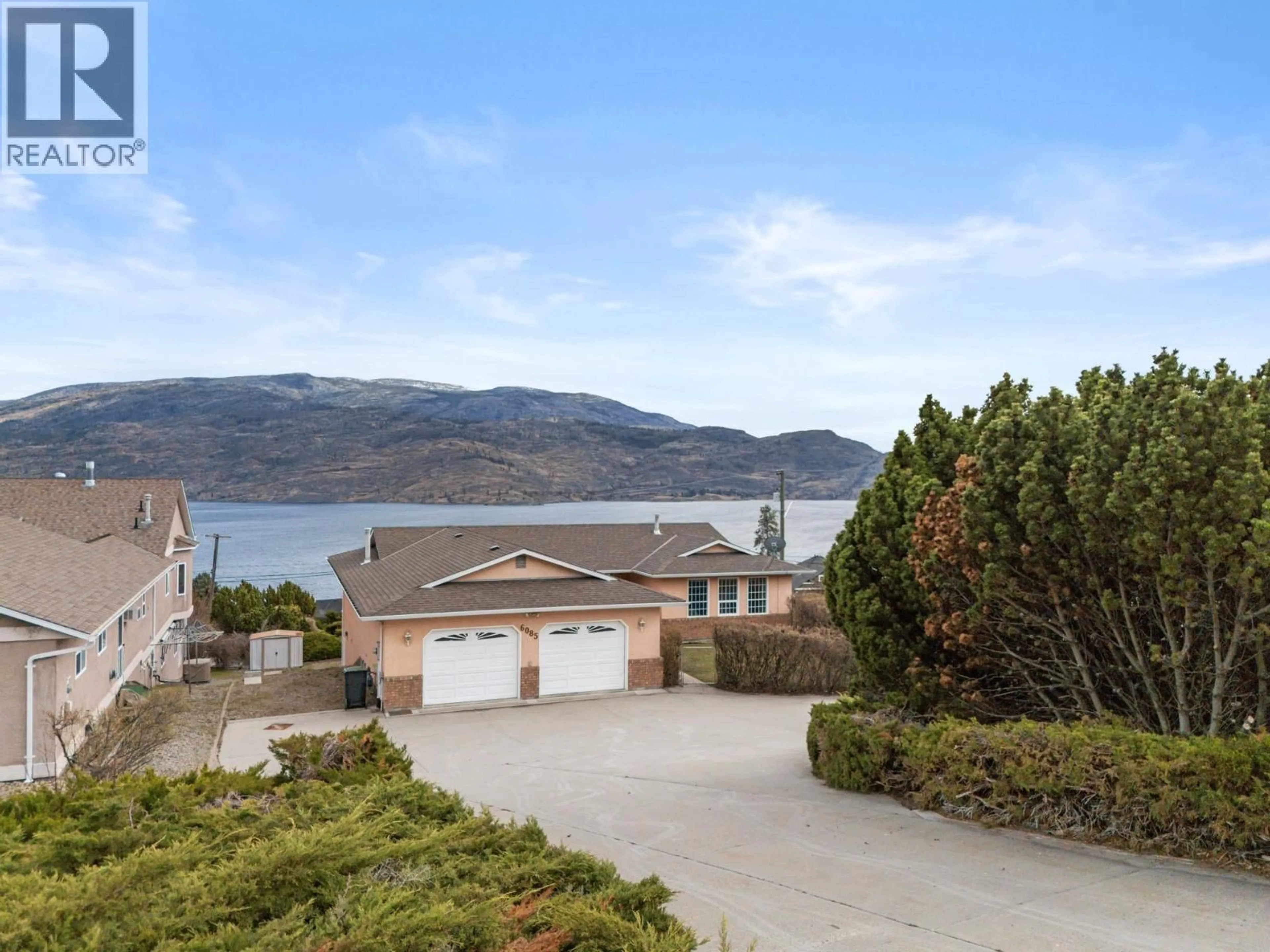 A pic from outside/outdoor area/front of a property/back of a property/a pic from drone, water/lake/river/ocean view for 6085 BEATRICE ROAD, Peachland British Columbia V0H1X4