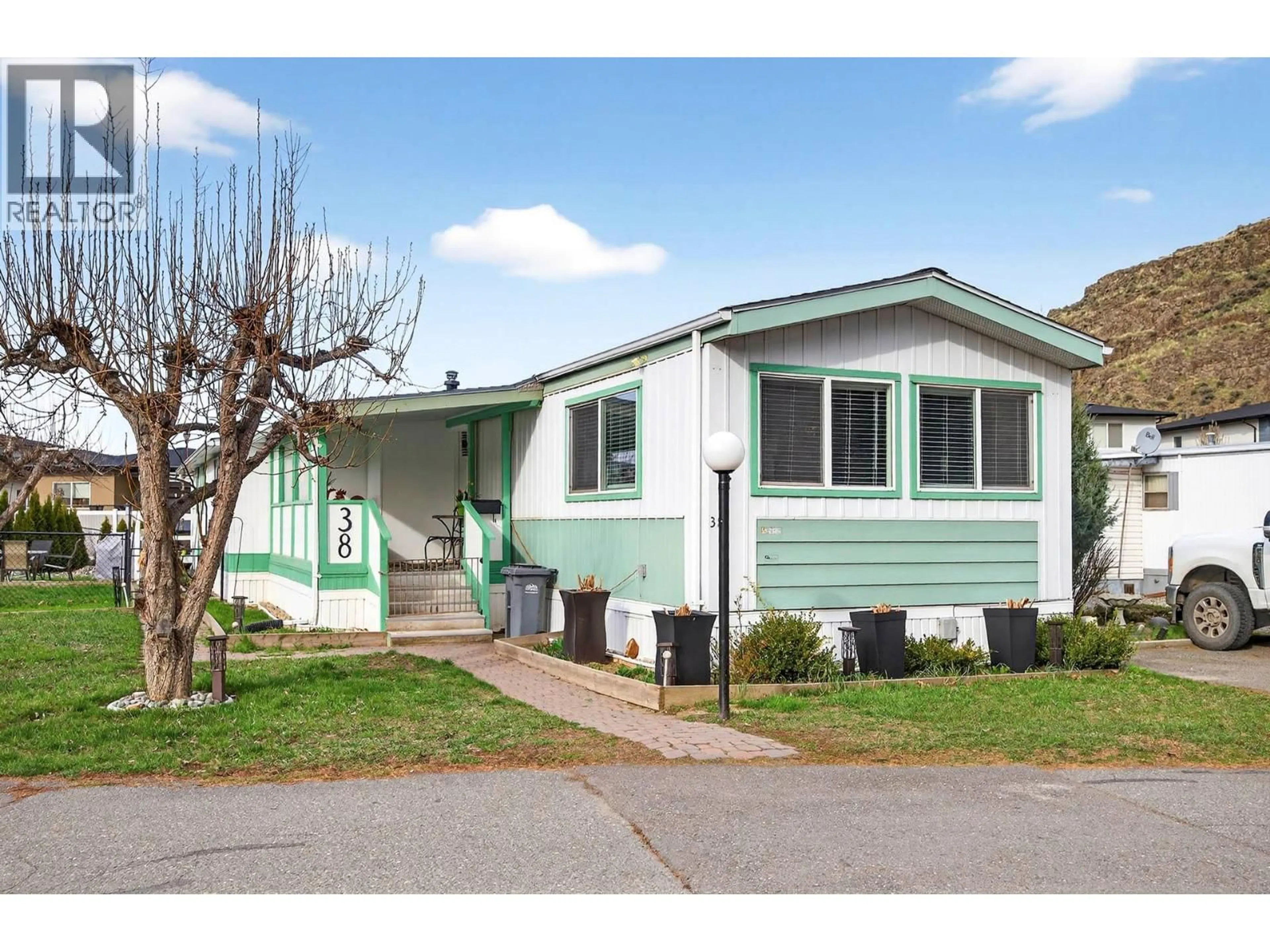 Home with vinyl exterior material, street for 38 - 2401 ORD ROAD, Kamloops British Columbia V2B7V8