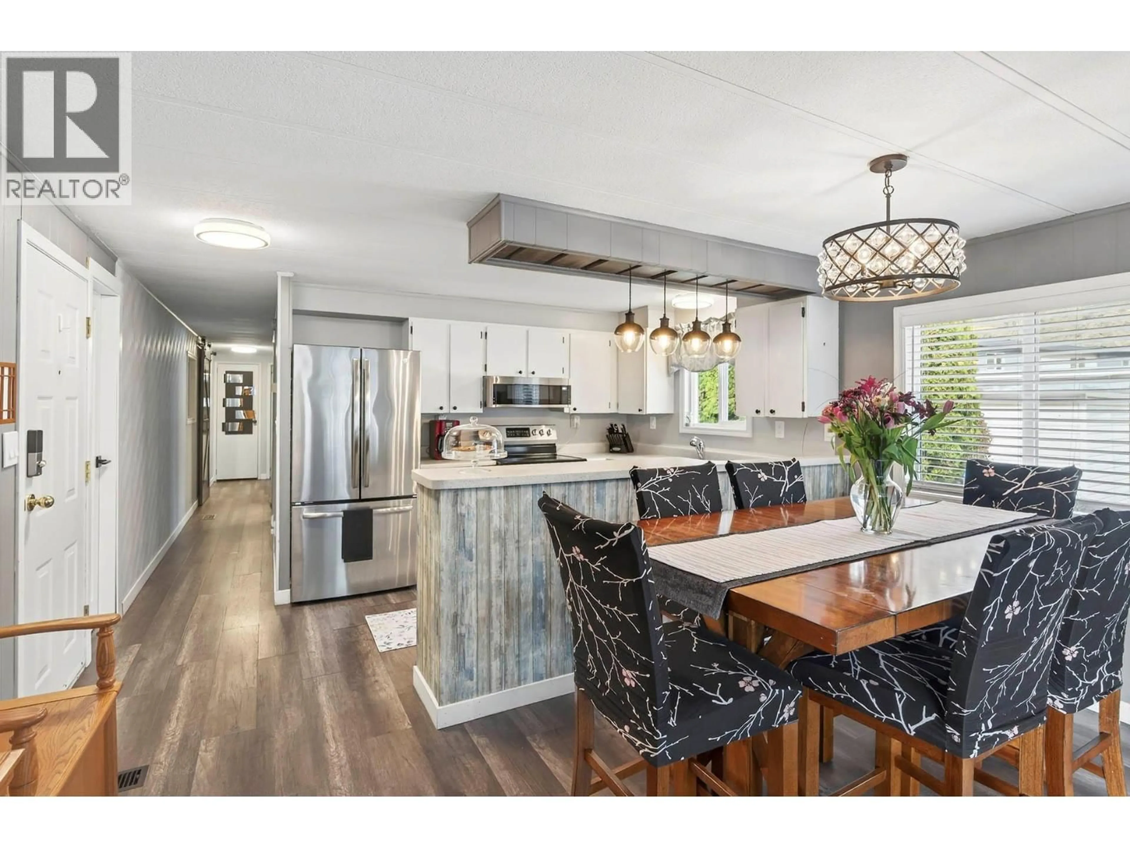 Open concept kitchen, wood/laminate floor for 38 - 2401 ORD ROAD, Kamloops British Columbia V2B7V8