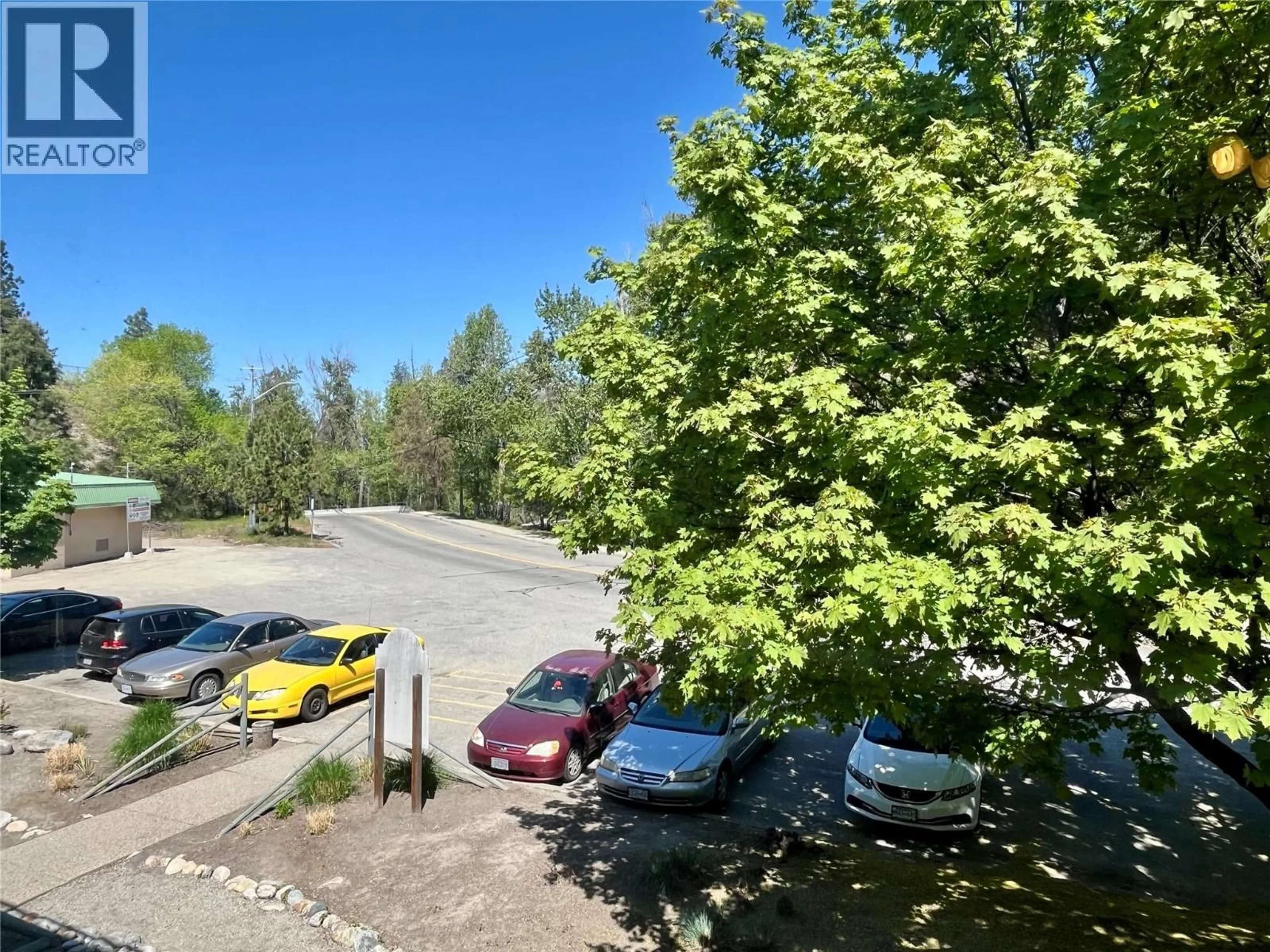 A pic from outside/outdoor area/front of a property/back of a property/a pic from drone, forest/trees view for 202 - 1410 PENTICTON AVENUE, Penticton British Columbia V2A2N5