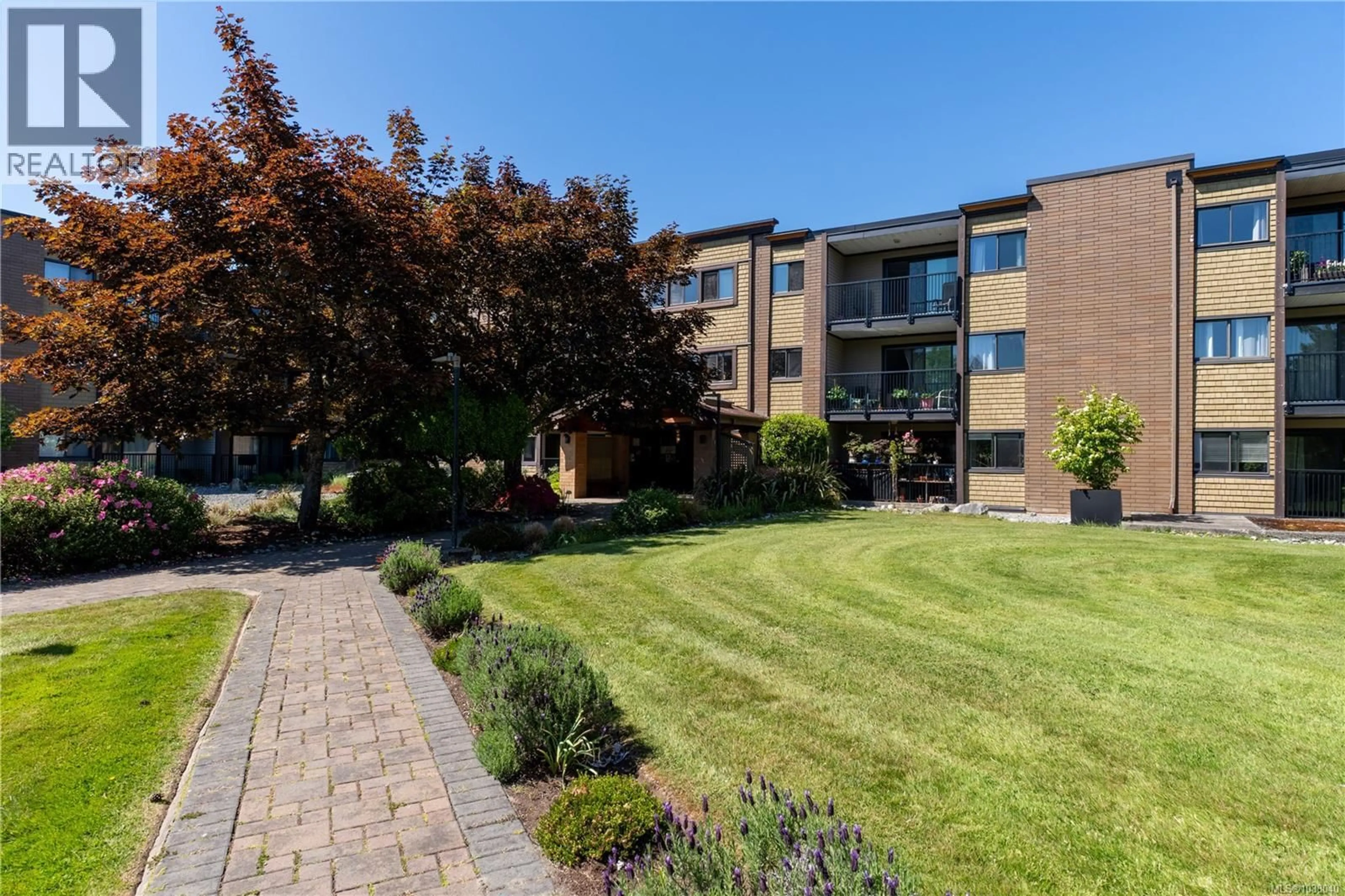 A pic from outside/outdoor area/front of a property/back of a property/a pic from drone, street for 220 - 1870 MCKENZIE AVENUE, Saanich British Columbia V8N4X3