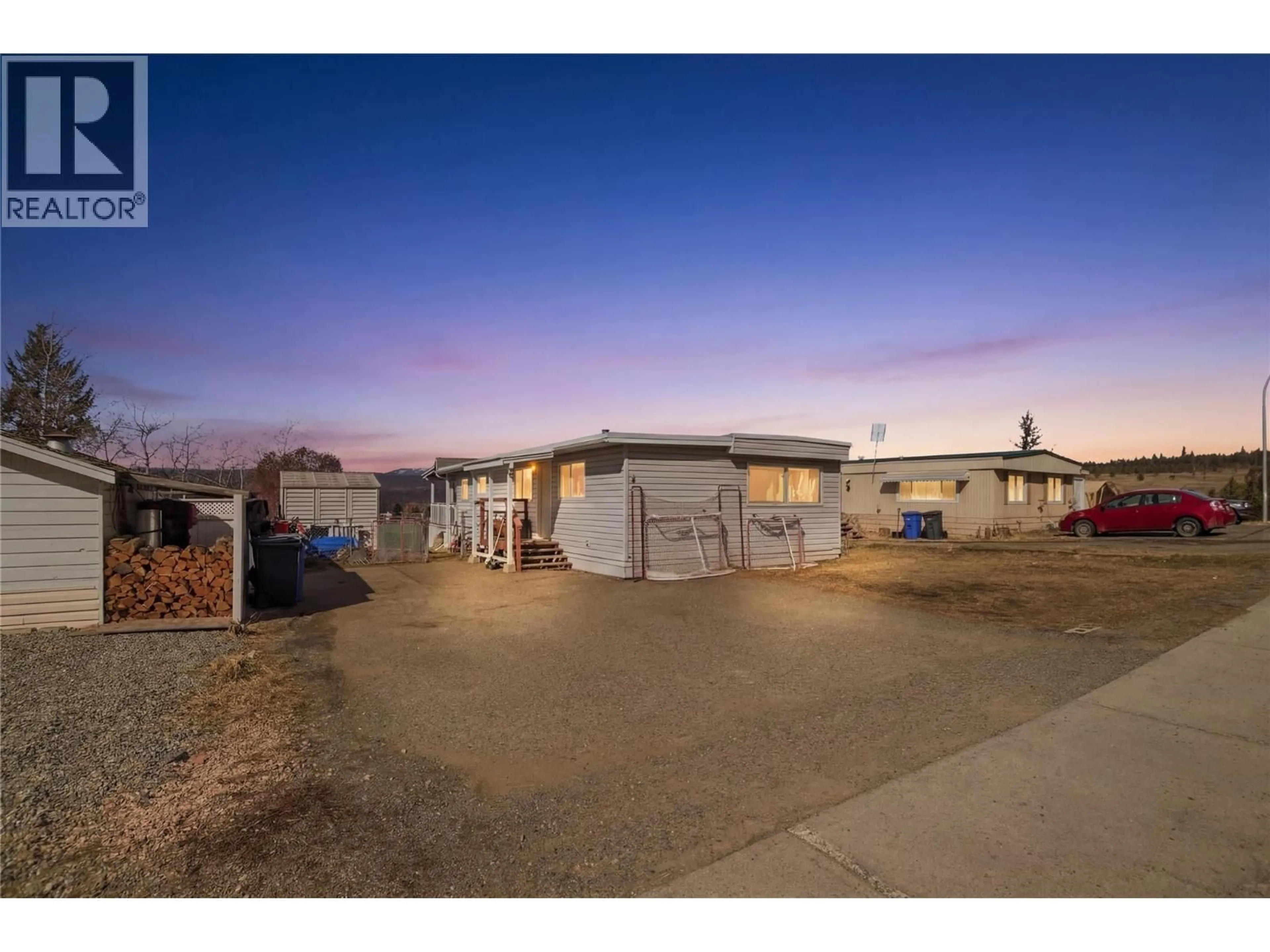 A pic from outside/outdoor area/front of a property/back of a property/a pic from drone, street for 4 JASPER DRIVE, Logan Lake British Columbia V0K1W0