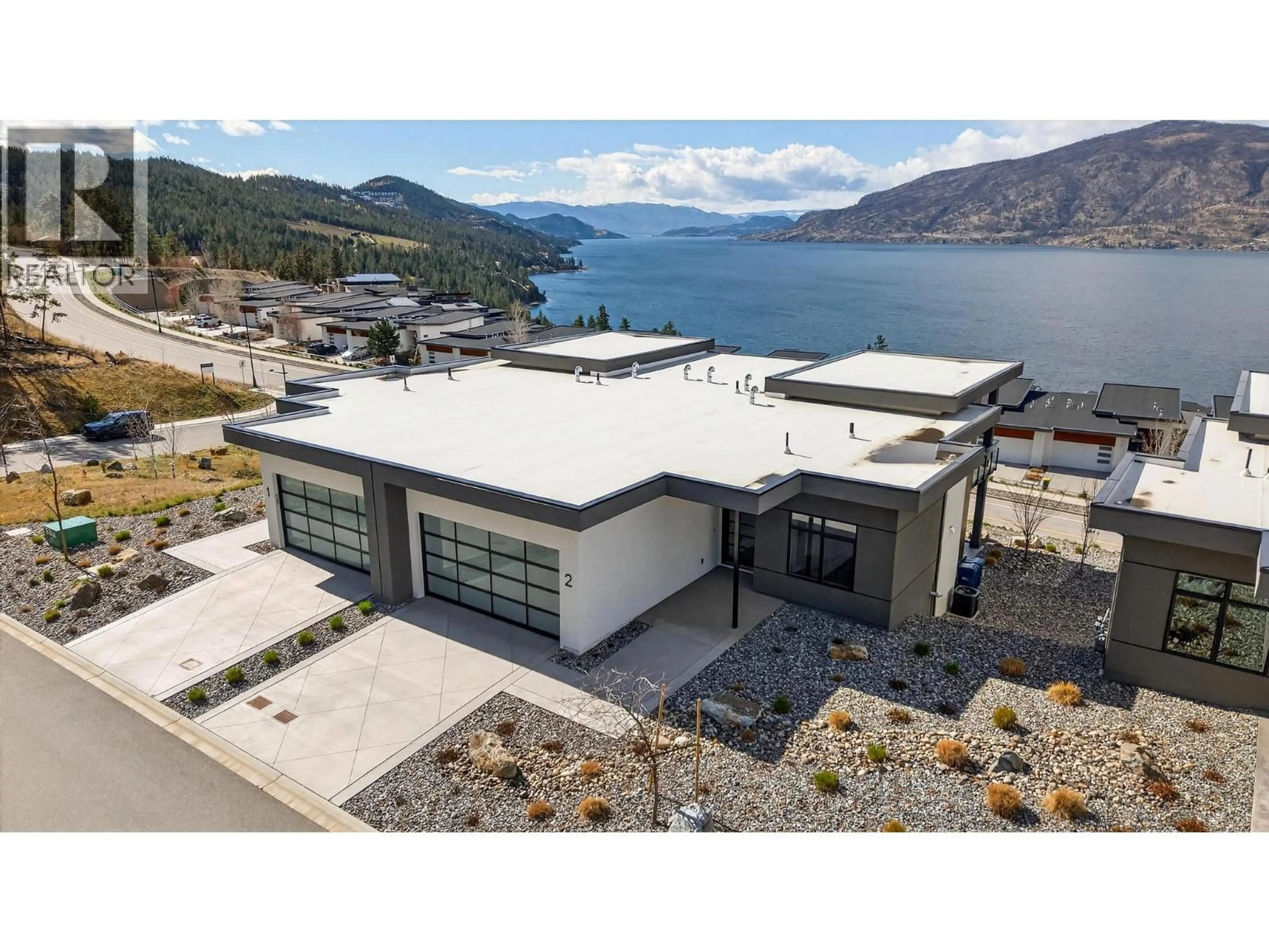 A pic from outside/outdoor area/front of a property/back of a property/a pic from drone, unknown for 2 - 9201 OKANAGAN CENTRE ROAD WEST, Lake Country British Columbia V4V0B8