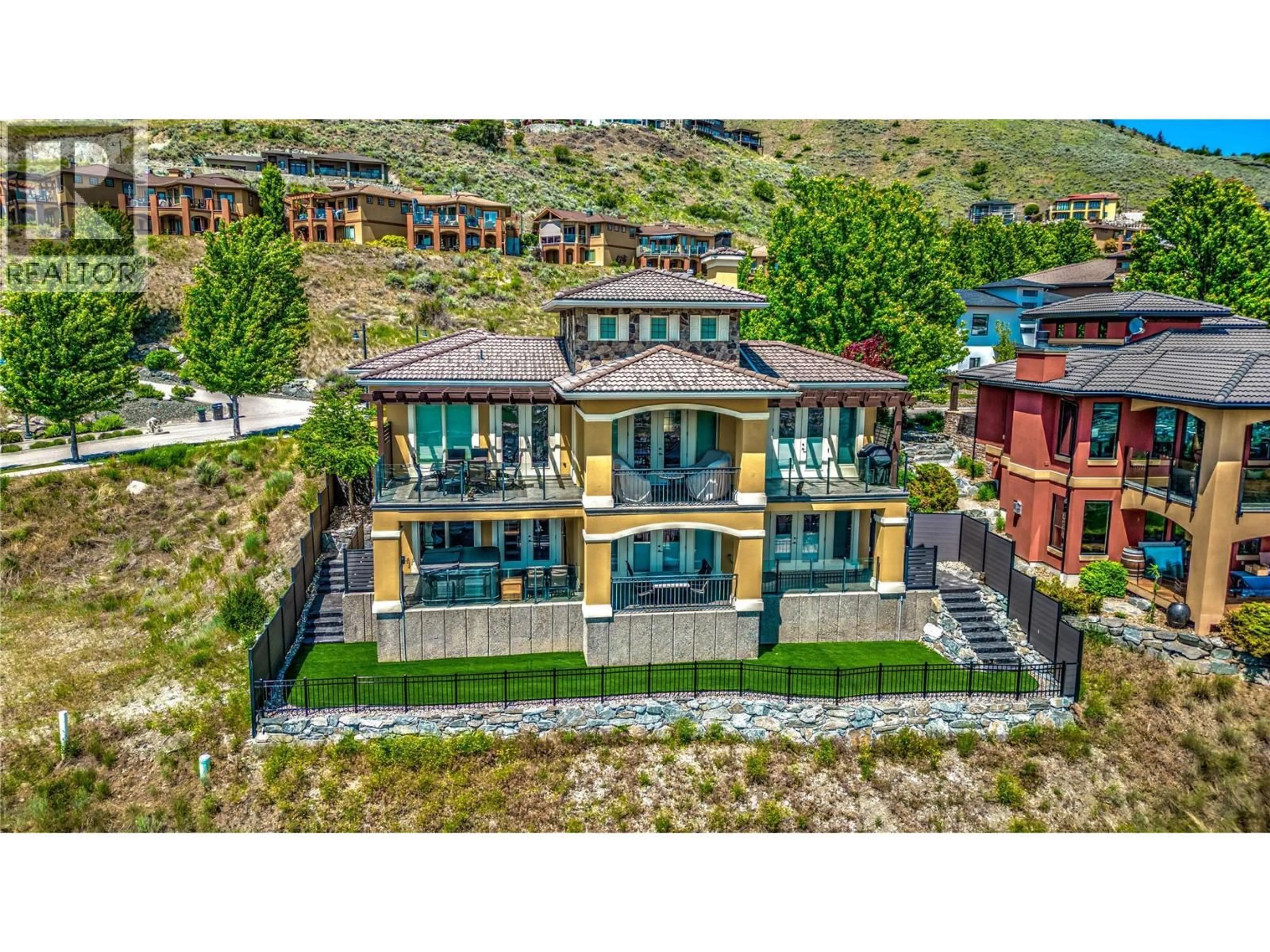 A pic from outside/outdoor area/front of a property/back of a property/a pic from drone, unknown for 304 CORDON PLACE, Vernon British Columbia V1A1Z9