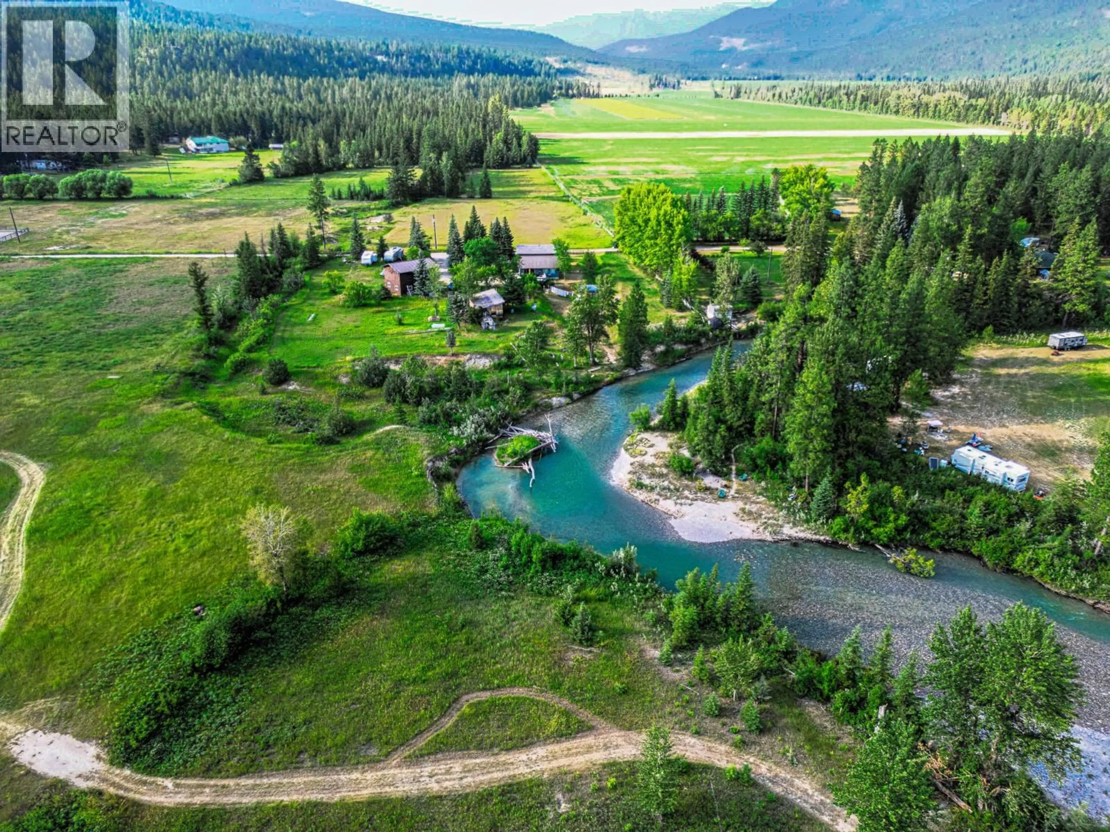 A pic from outside/outdoor area/front of a property/back of a property/a pic from drone, water/lake/river/ocean view for 3560 ISLAND POND ROAD, Skookumchuck British Columbia V0B2E0