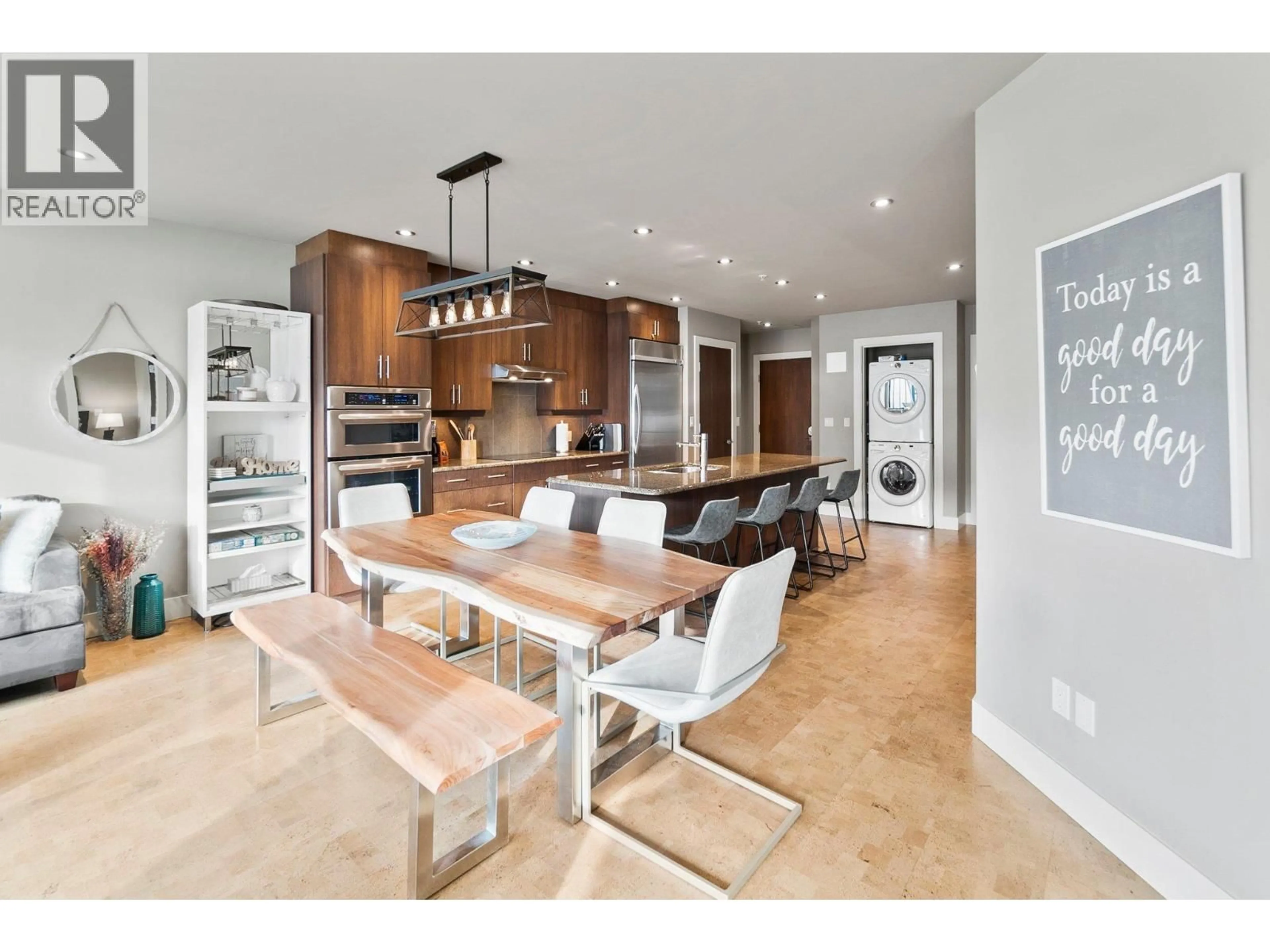 Open concept kitchen, wood/laminate floor for 105 - 326 MARA LAKE LANE, Sicamous British Columbia V0E2V1