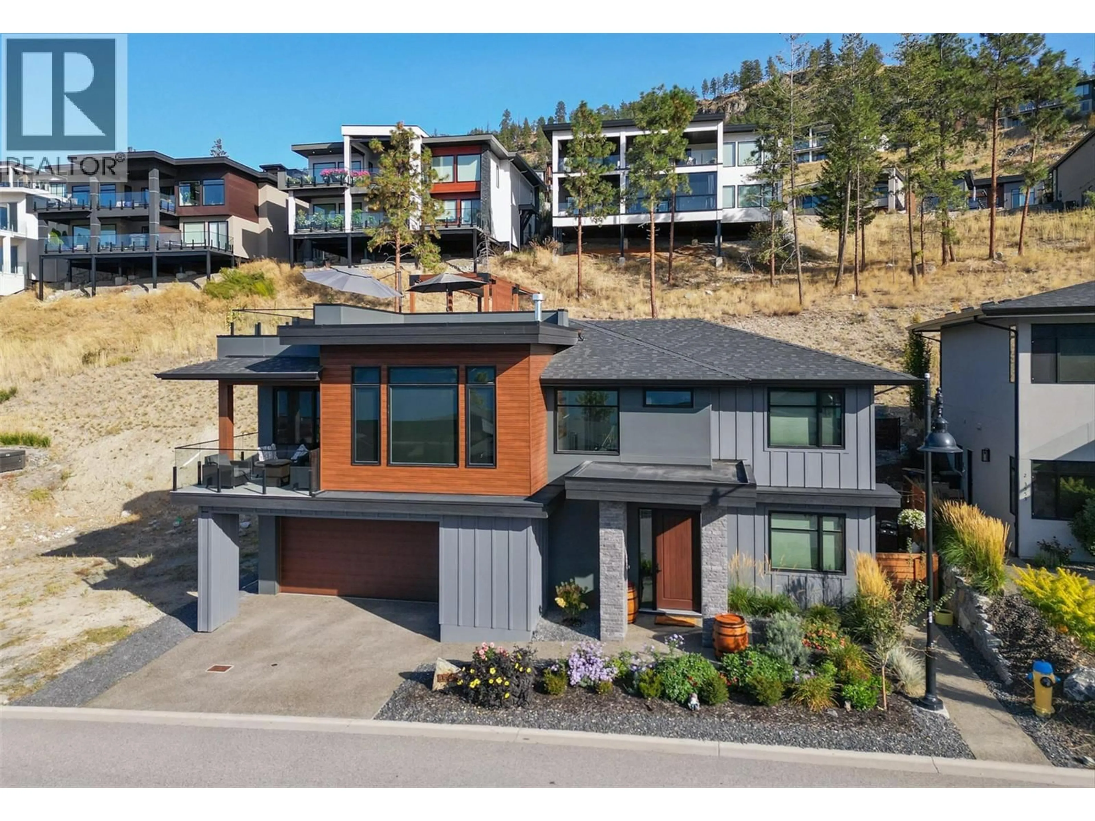 A pic from outside/outdoor area/front of a property/back of a property/a pic from drone, street for 3565 BOXWOOD ROAD, Kelowna British Columbia V1V3G2