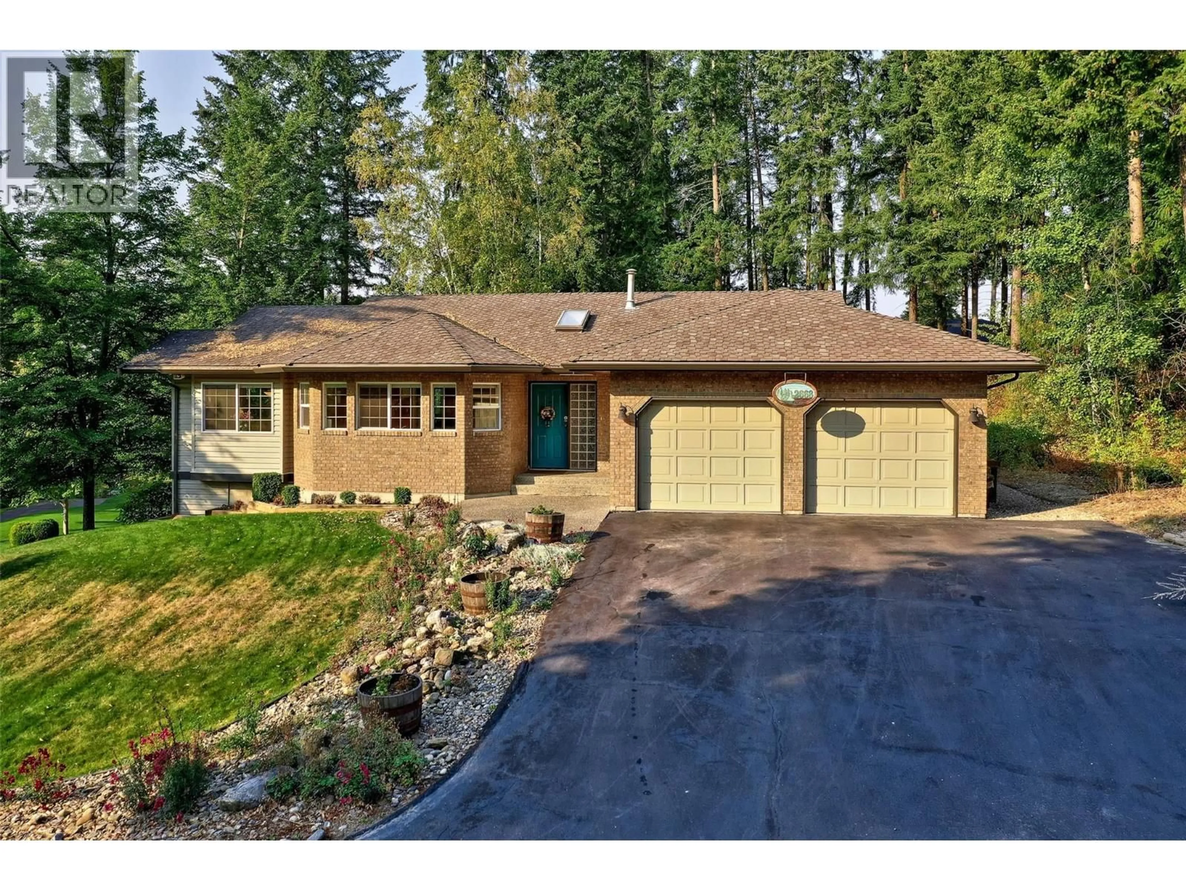 Home with vinyl exterior material, street for 2668 GOLF COURSE DRIVE, Blind Bay British Columbia V0E1H2