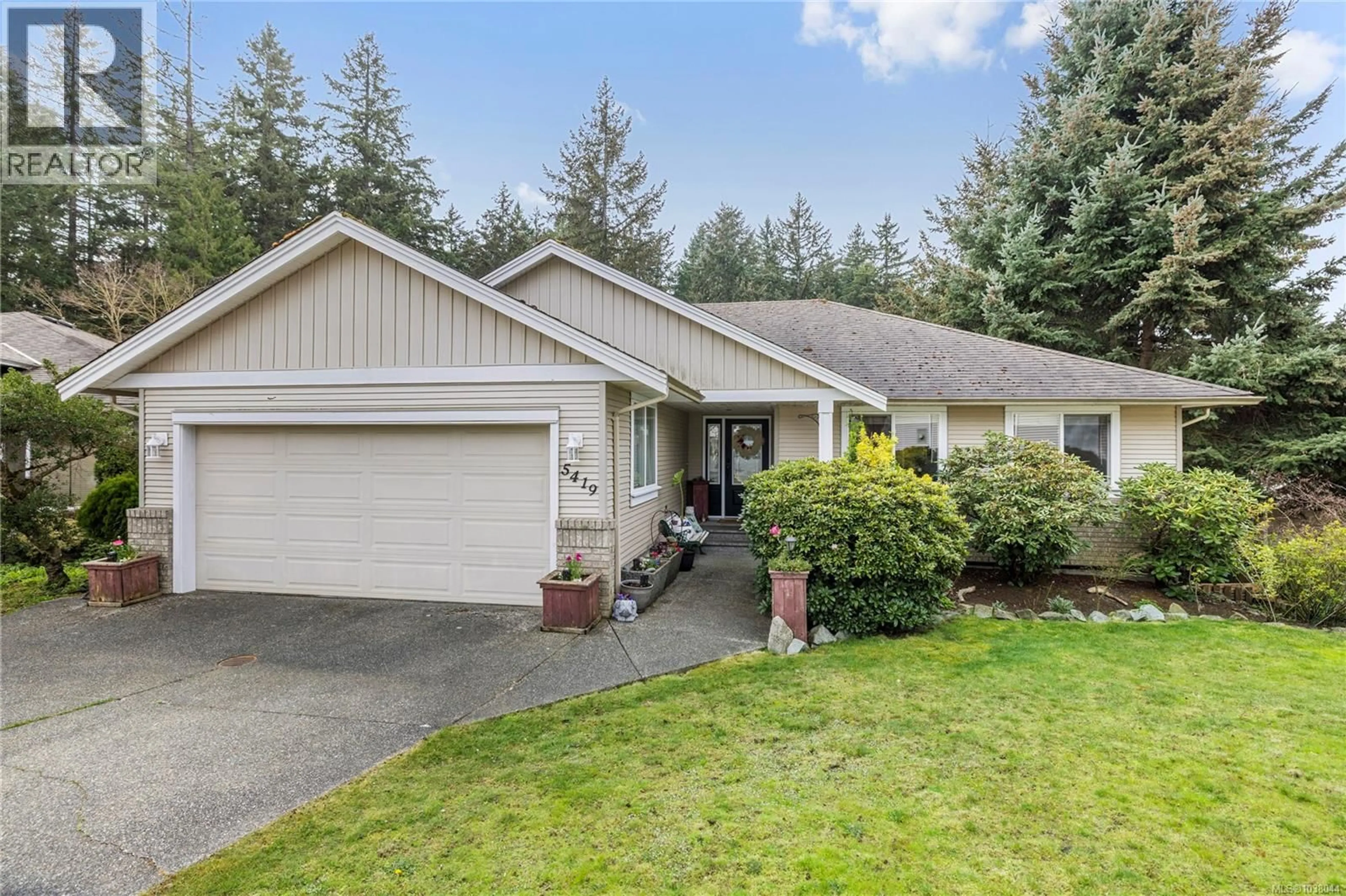 Home with vinyl exterior material, street for 5419 COLINWOOD DRIVE, Nanaimo British Columbia V9T6G2