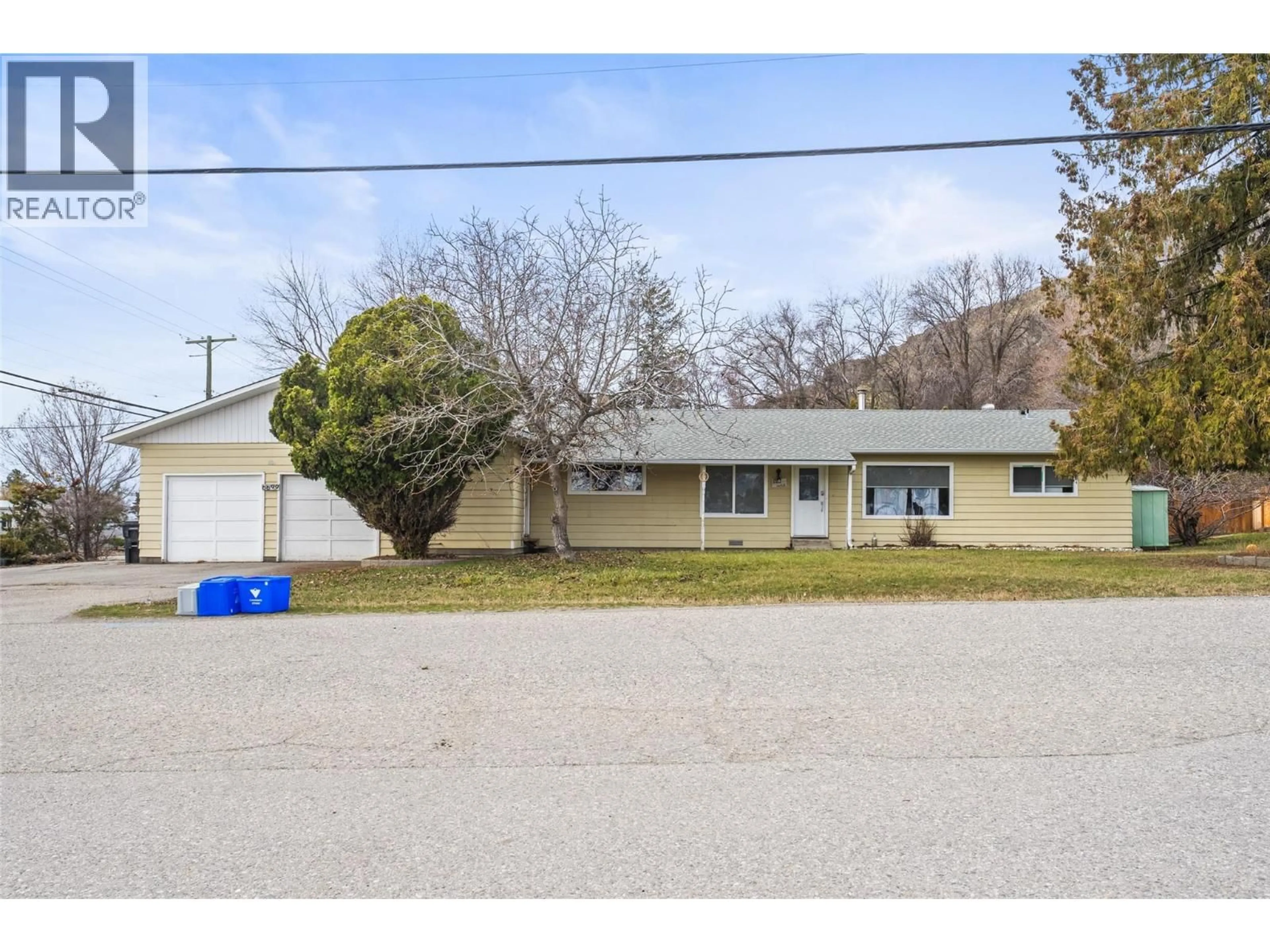 A pic from outside/outdoor area/front of a property/back of a property/a pic from drone, street for 6699 SCOTT ROAD, Vernon British Columbia V1H1N4