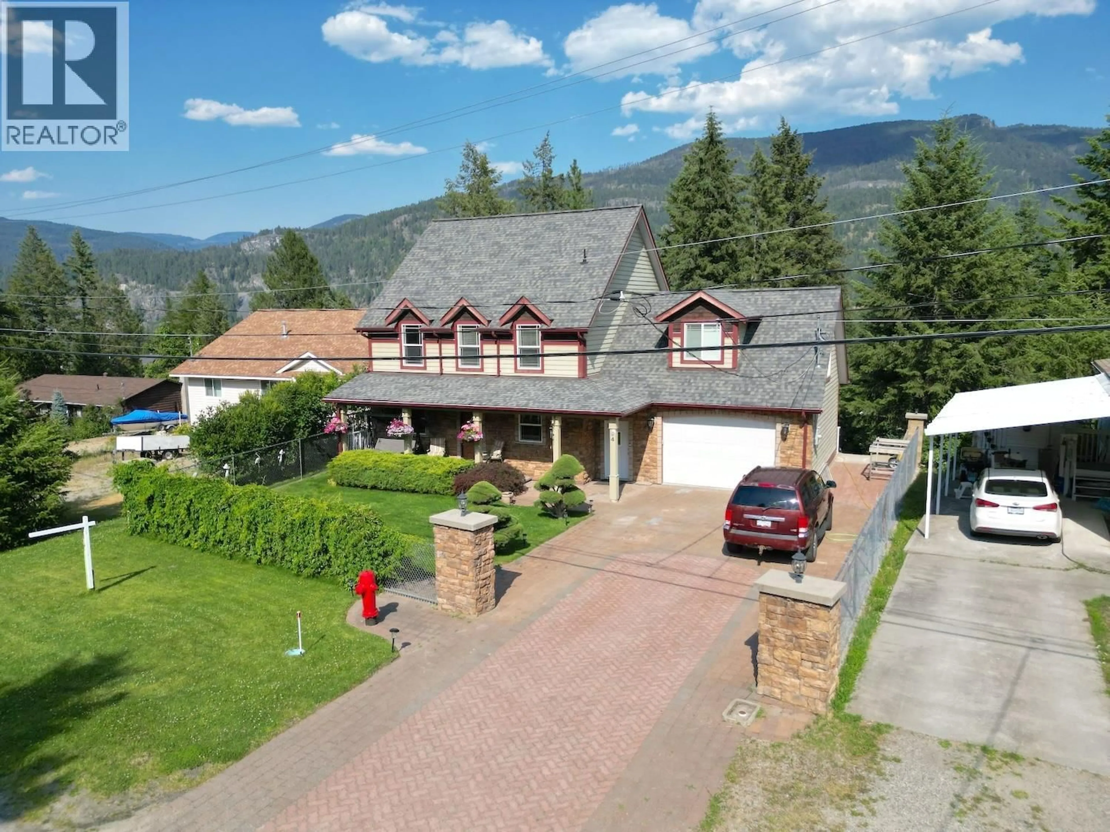 A pic from outside/outdoor area/front of a property/back of a property/a pic from drone, mountain view for 94 CHASE ROAD, Christina Lake British Columbia V0H1E0