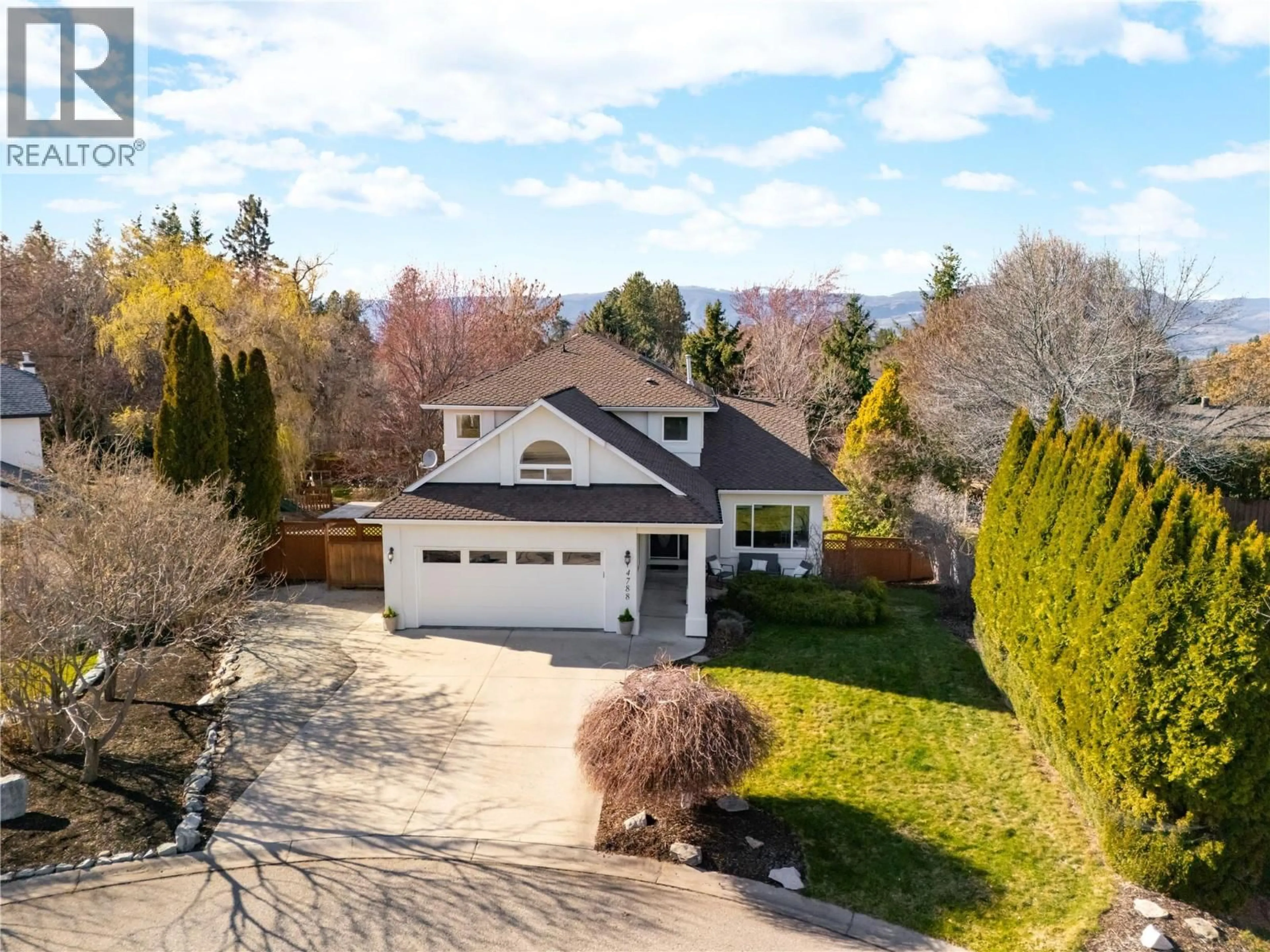 A pic from outside/outdoor area/front of a property/back of a property/a pic from drone, unknown for 4788 REDRIDGE ROAD, Kelowna British Columbia V1W3A6