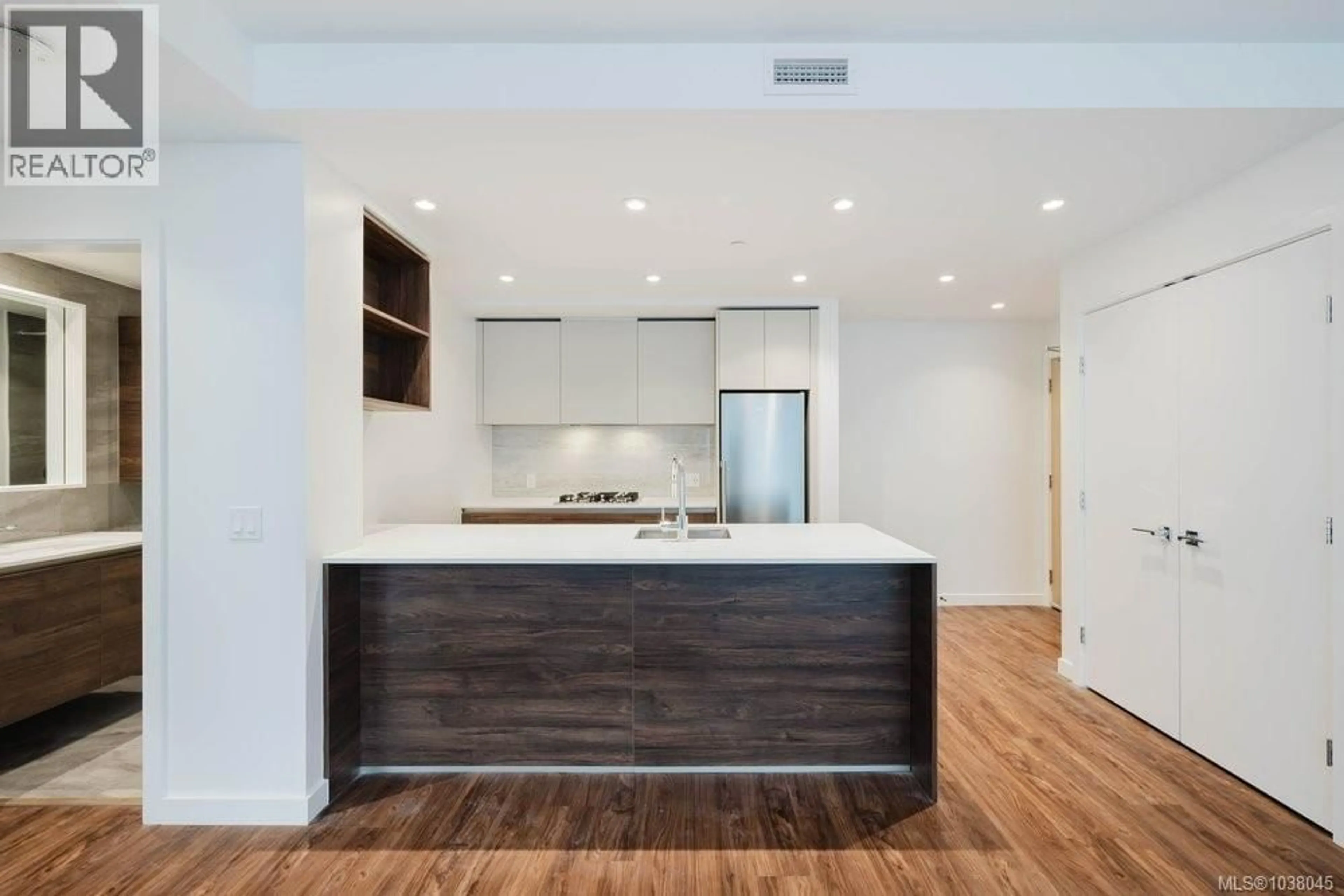 Contemporary kitchen, wood/laminate floor for 409 - 369 TYEE ROAD, Victoria British Columbia V9A0B6