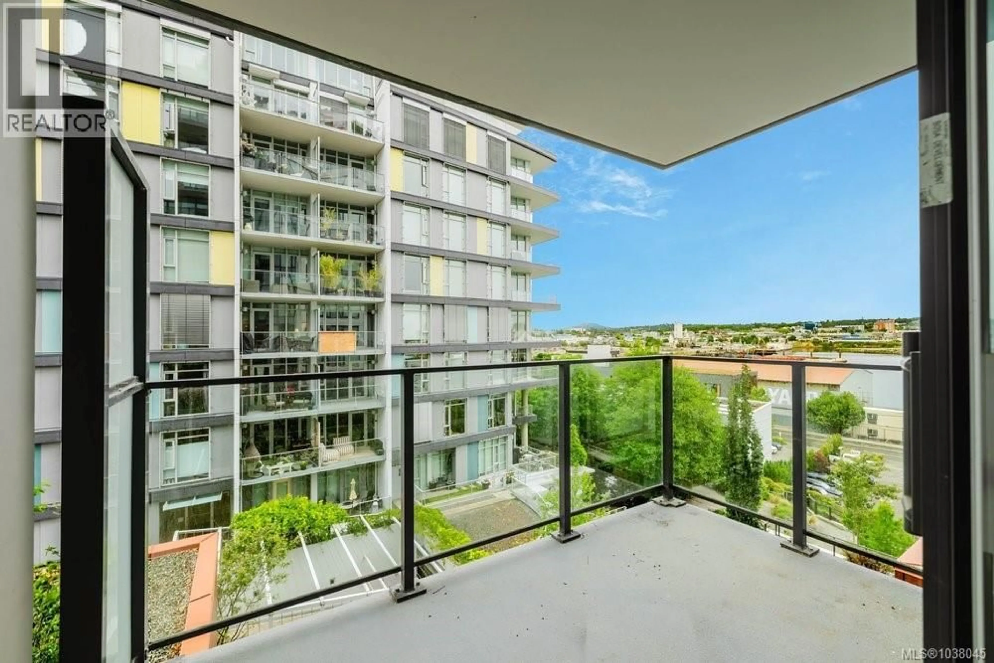 Balcony in the apartment, city buildings view from balcony for 409 - 369 TYEE ROAD, Victoria British Columbia V9A0B6