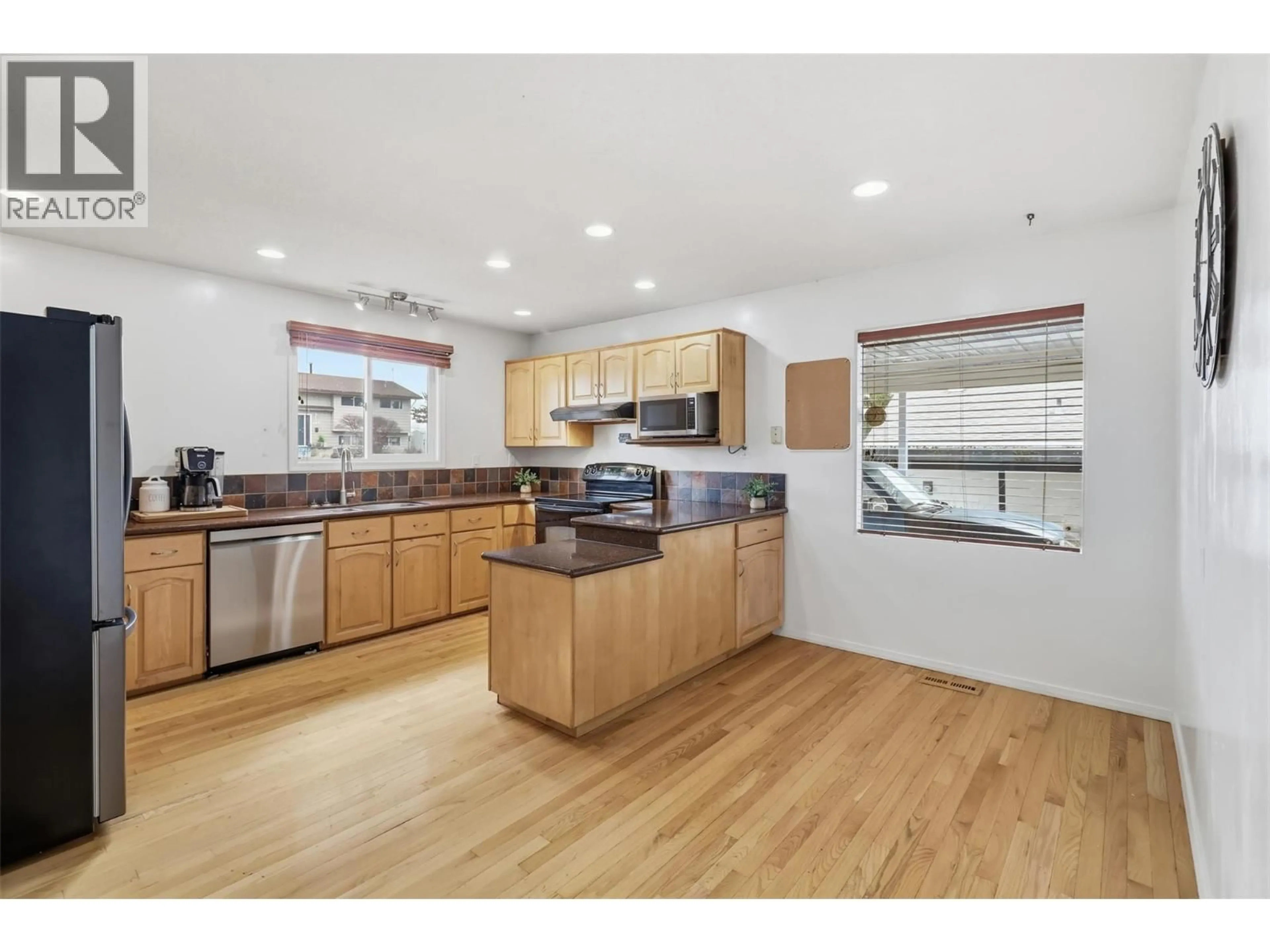 Open concept kitchen, wood/laminate floor for 478 OPAL DRIVE, Logan Lake British Columbia V0K1W0