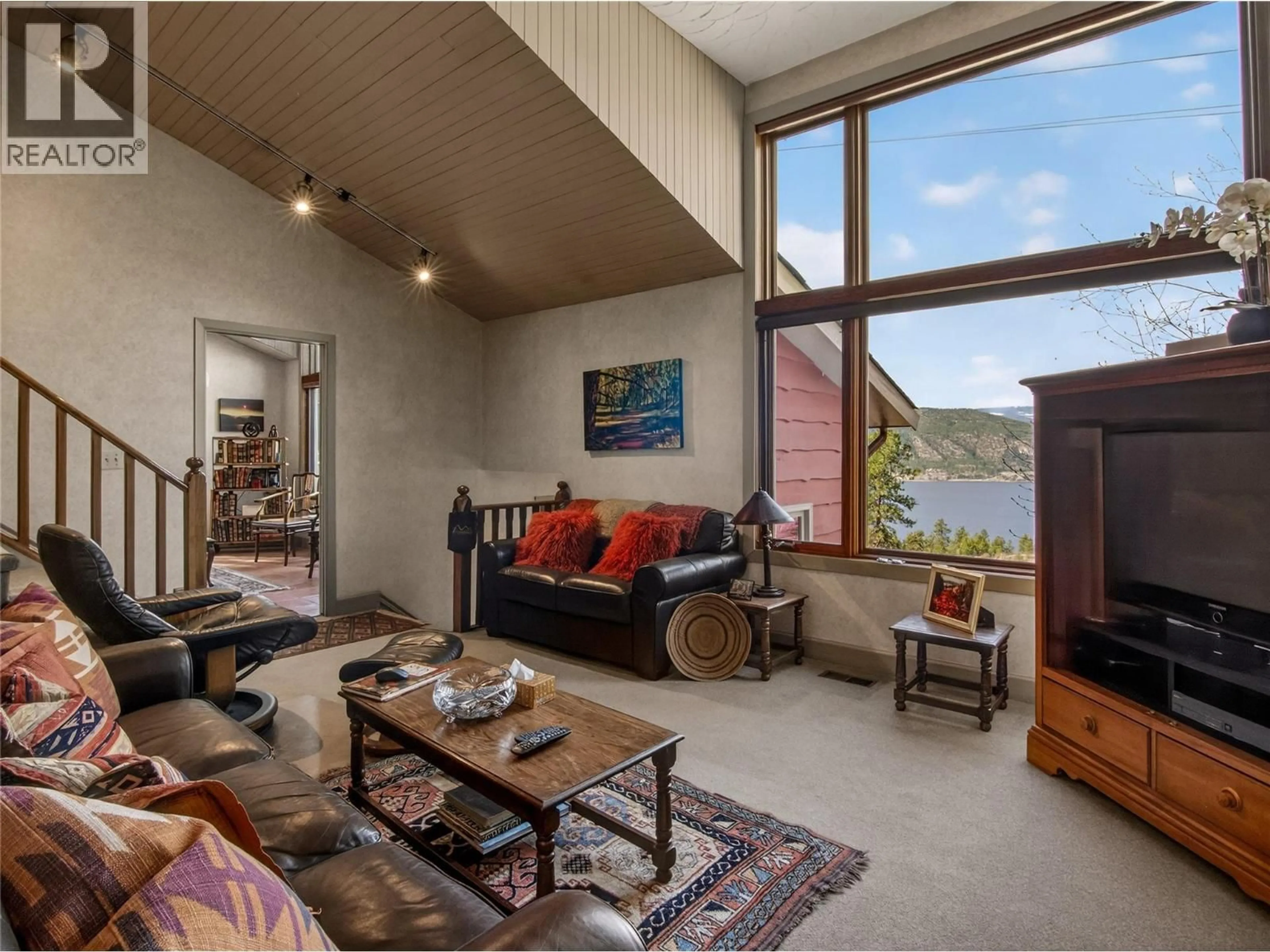 Living room with furniture, cement floor for 1910 SUTHERLAND ROAD, Penticton British Columbia V2A8T8