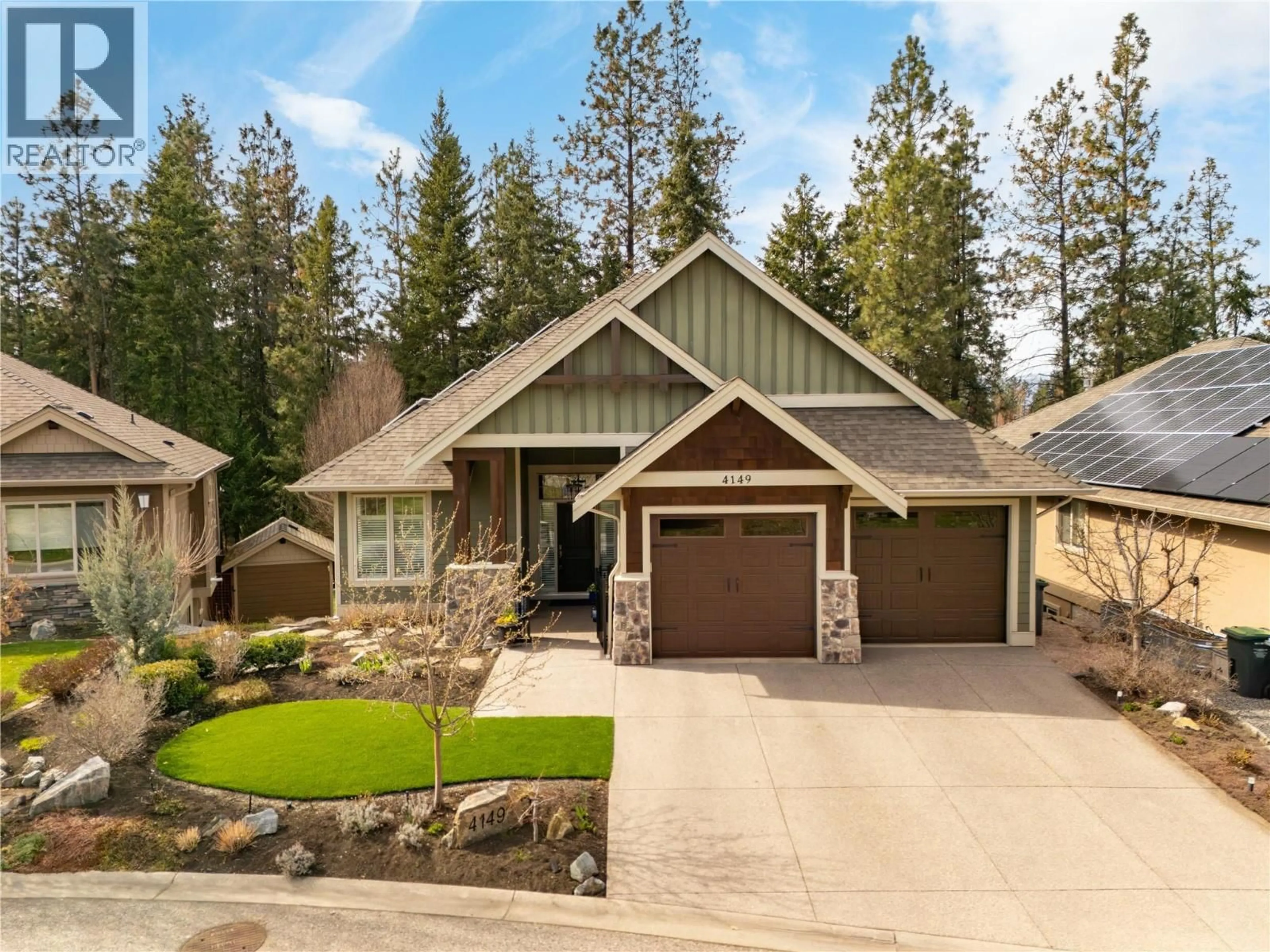 Home with vinyl exterior material, street for 4149 GALLAGHERS FAIRWAY SOUTH, Kelowna British Columbia V1W5G3