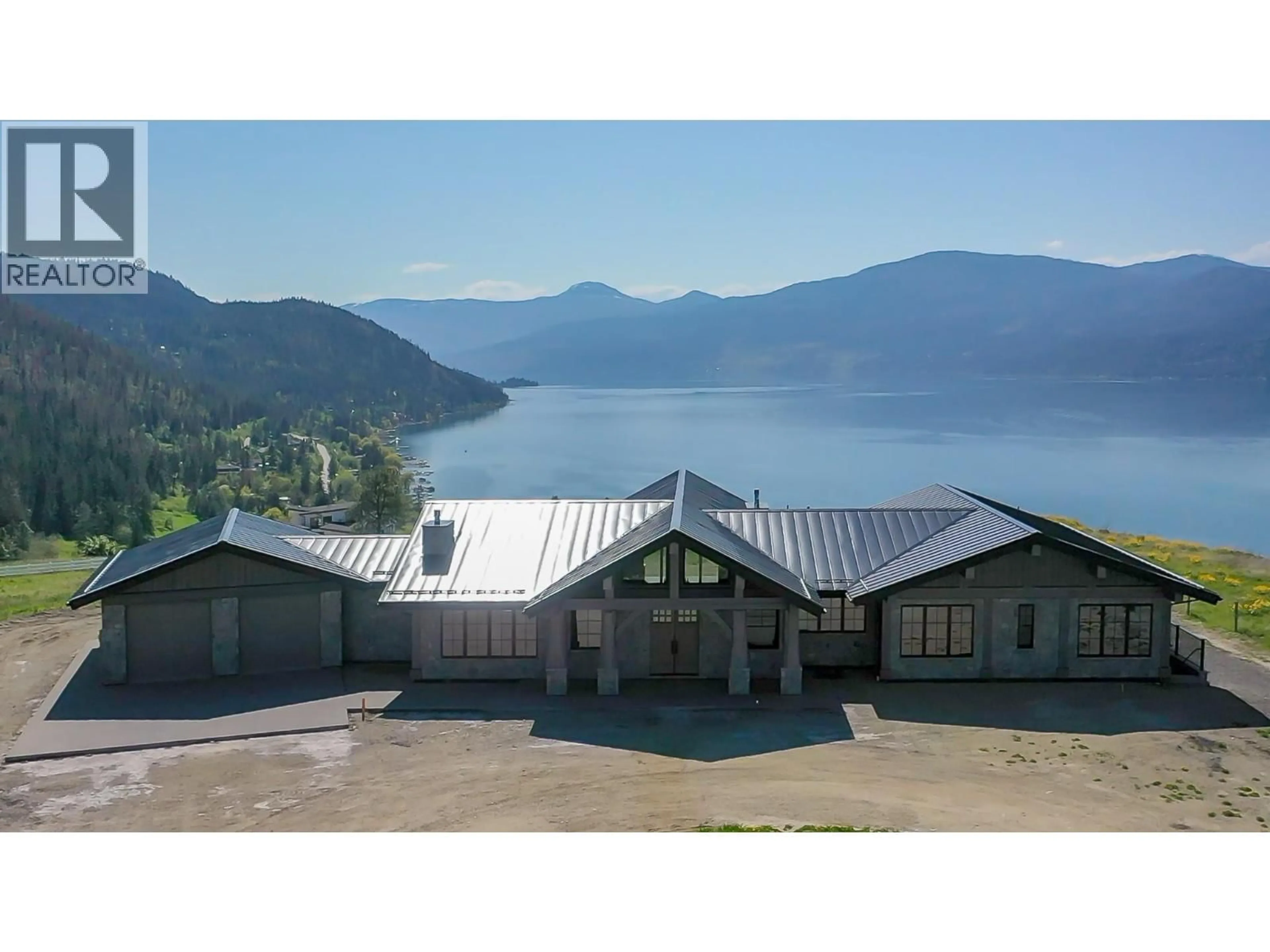 A pic from outside/outdoor area/front of a property/back of a property/a pic from drone, water/lake/river/ocean view for 8399 BENCH ROW ROAD, Vernon British Columbia V1H1H3