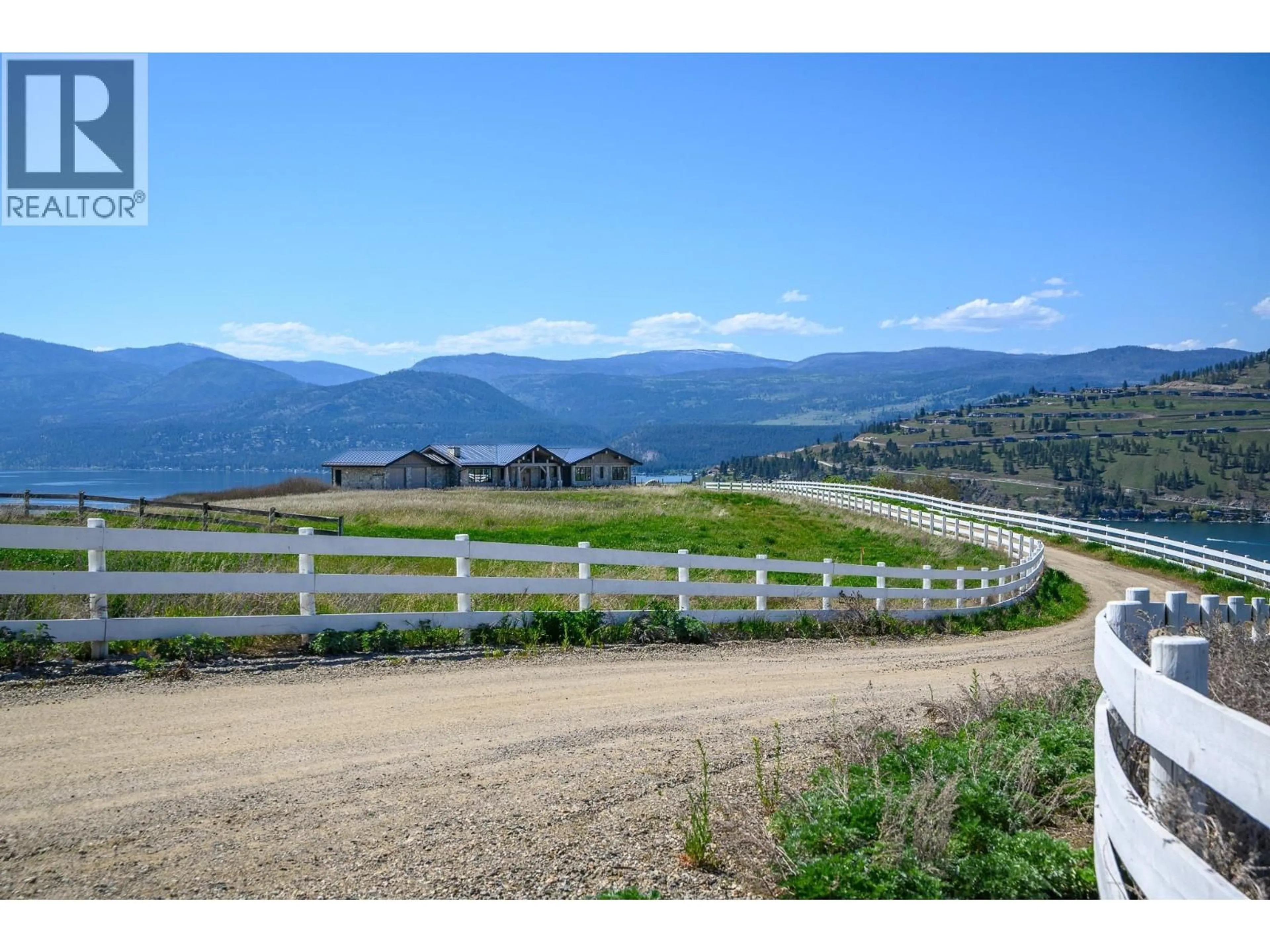 A pic from outside/outdoor area/front of a property/back of a property/a pic from drone, mountain view for 8399 BENCH ROW ROAD, Vernon British Columbia V1H1H3