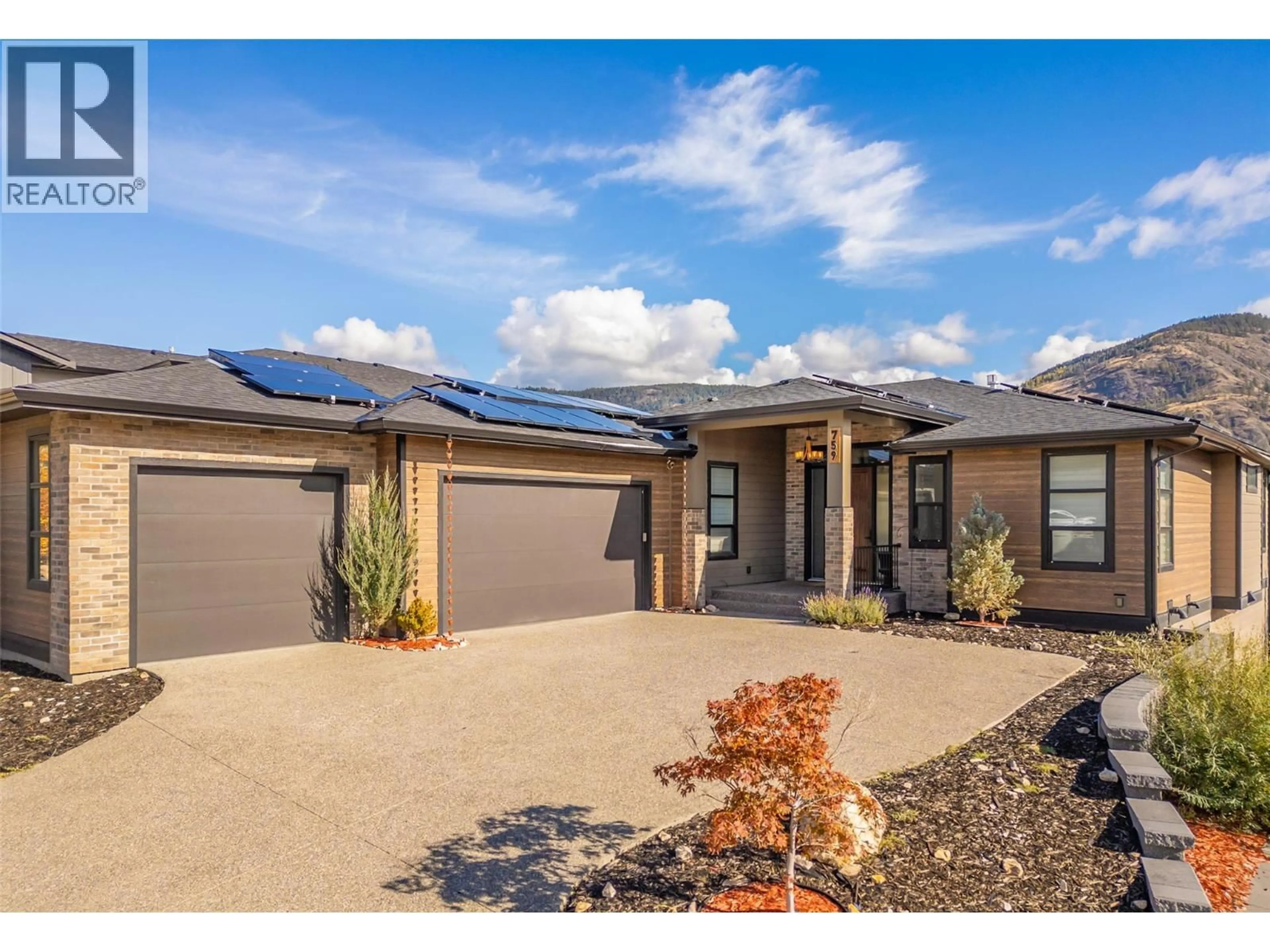 Home with brick exterior material, street for 759 CARNOUSTIE DRIVE, Kelowna British Columbia V1P1V2