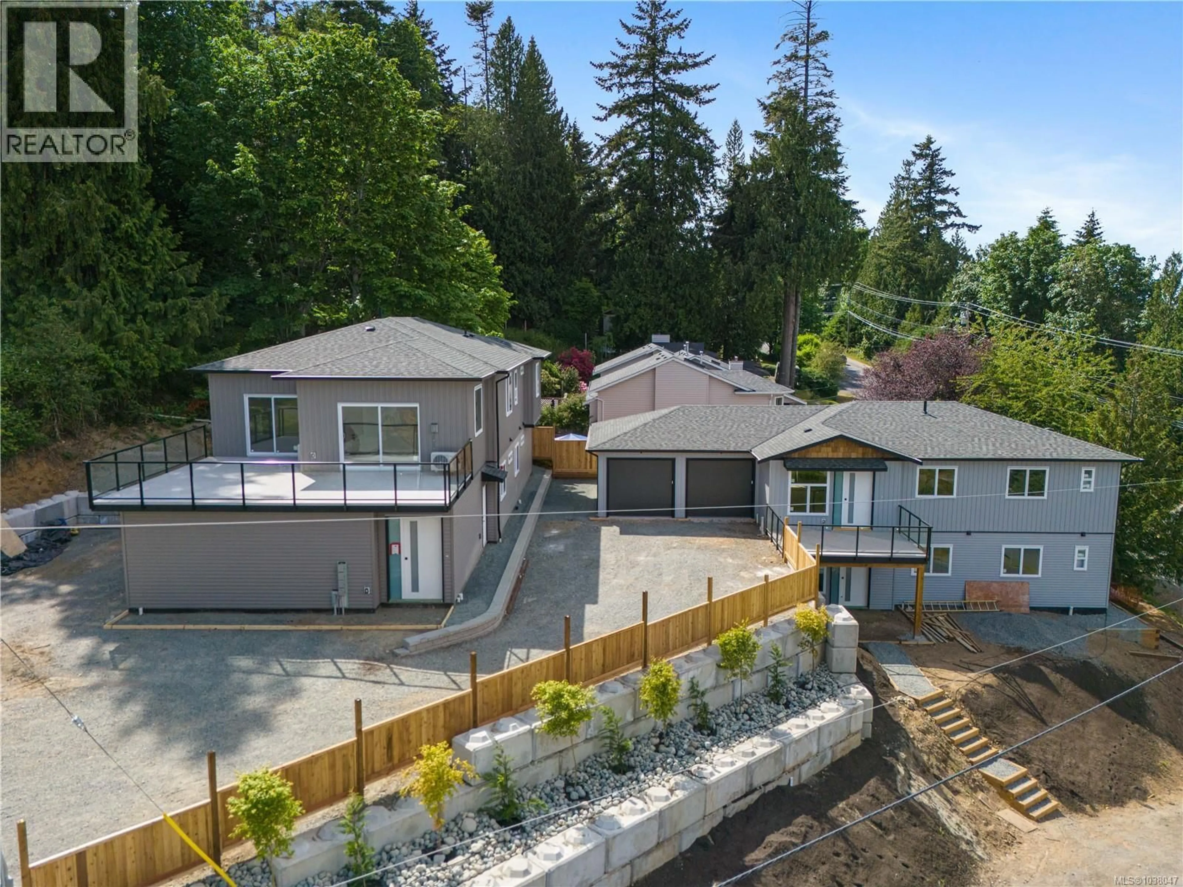 A pic from outside/outdoor area/front of a property/back of a property/a pic from drone, unknown for 201 - 5311 TOMS TURNABOUT, Nanaimo British Columbia V9T5M9