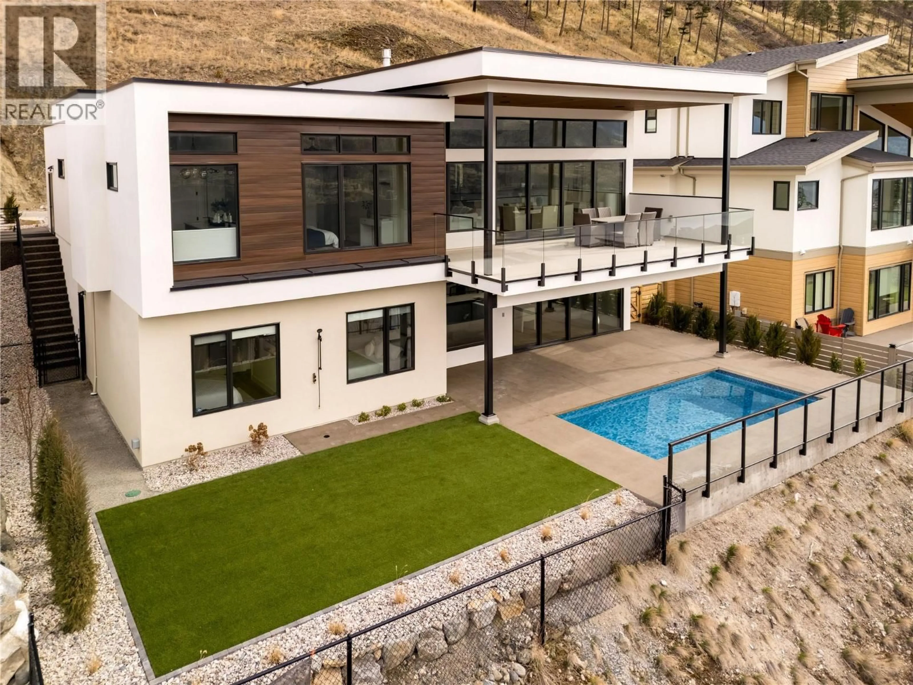 A pic from outside/outdoor area/front of a property/back of a property/a pic from drone, mountain view for 573 CLIFTON COURT, Kelowna British Columbia V1V0B7