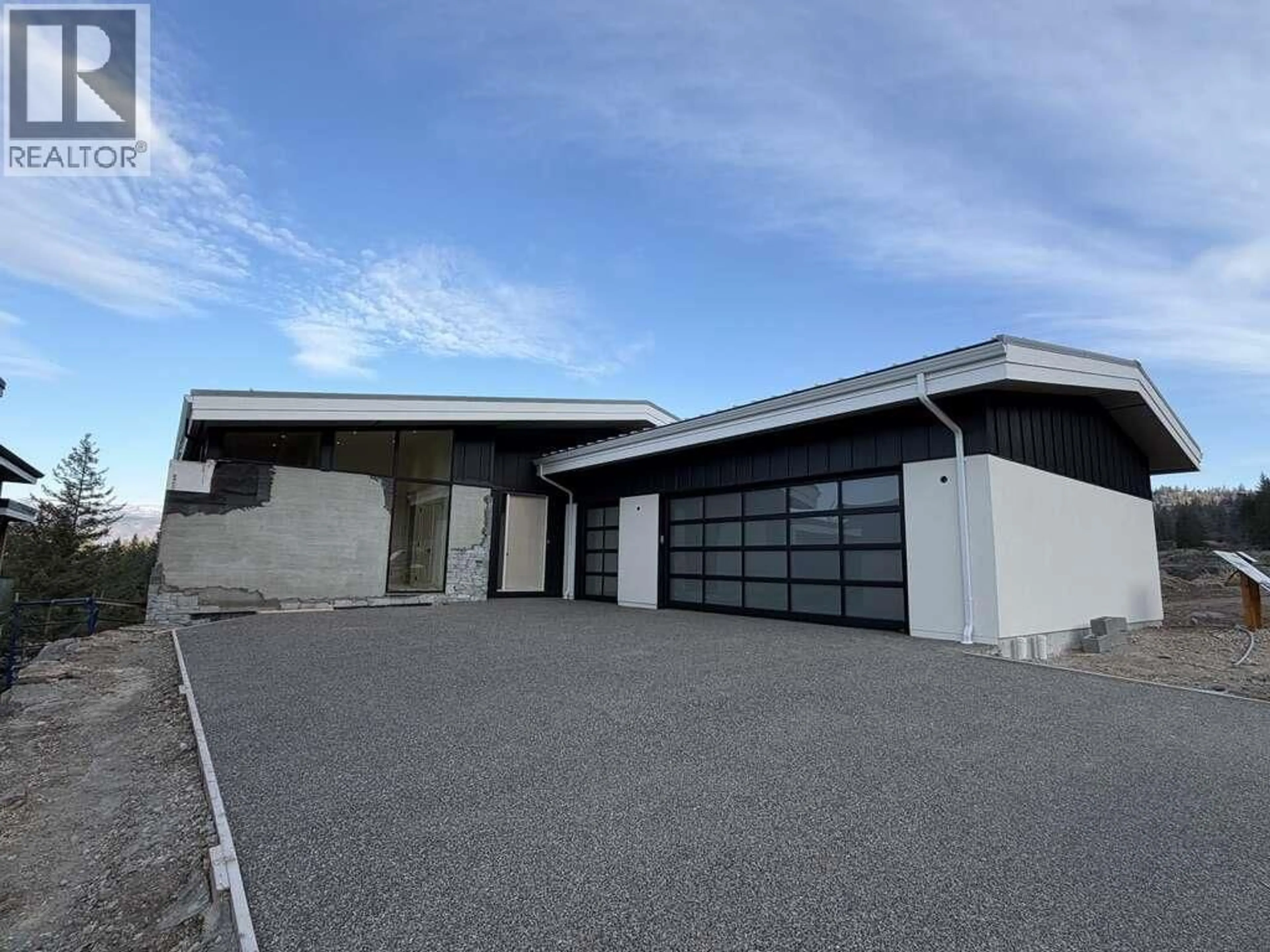 A pic from outside/outdoor area/front of a property/back of a property/a pic from drone, building for 866 PREDATOR RIDGE DRIVE, Vernon British Columbia V1H1G4