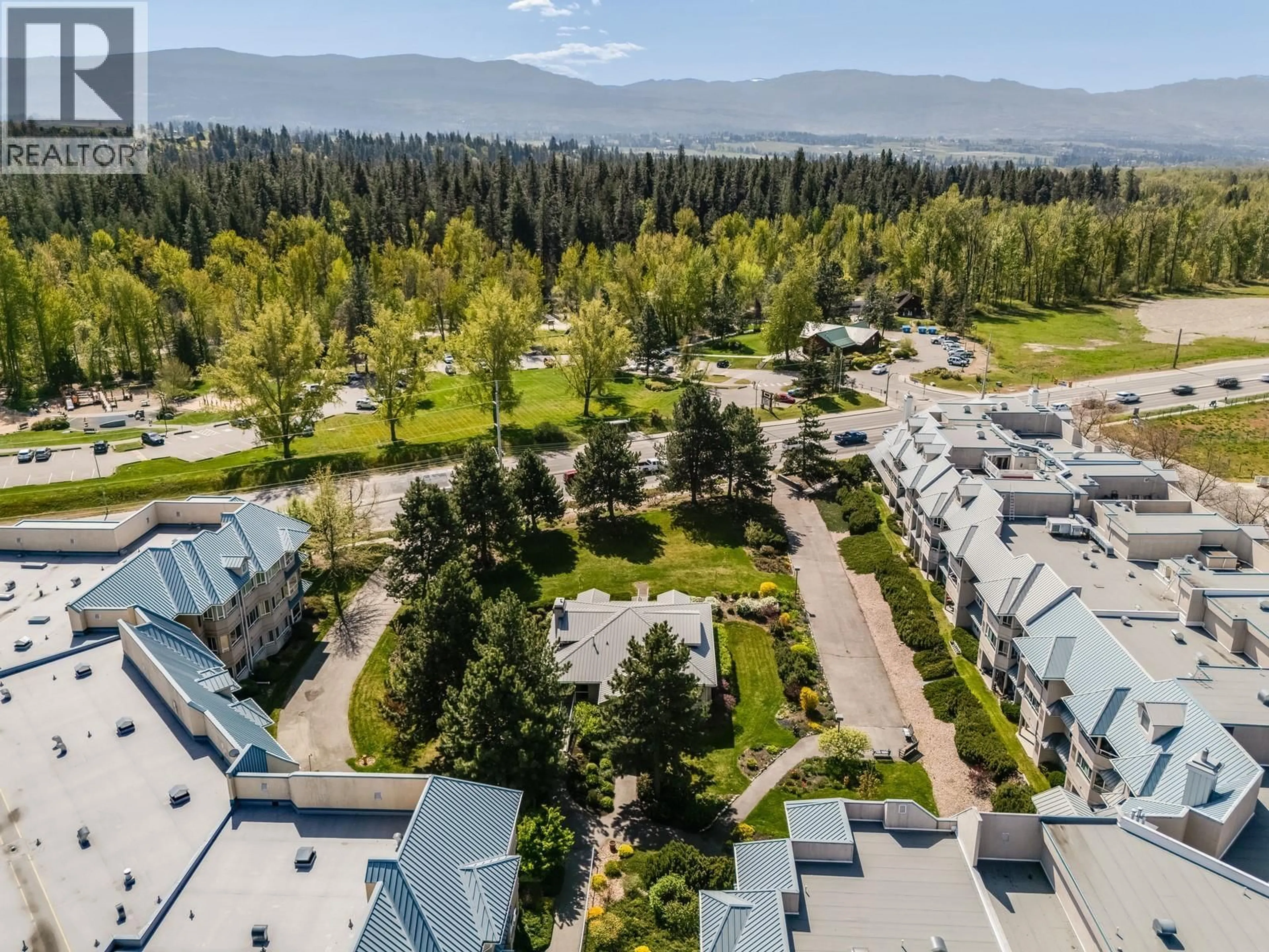 A pic from outside/outdoor area/front of a property/back of a property/a pic from drone, mountain view for 306 - 1961 DURNIN ROAD, Kelowna British Columbia V1X7Z6
