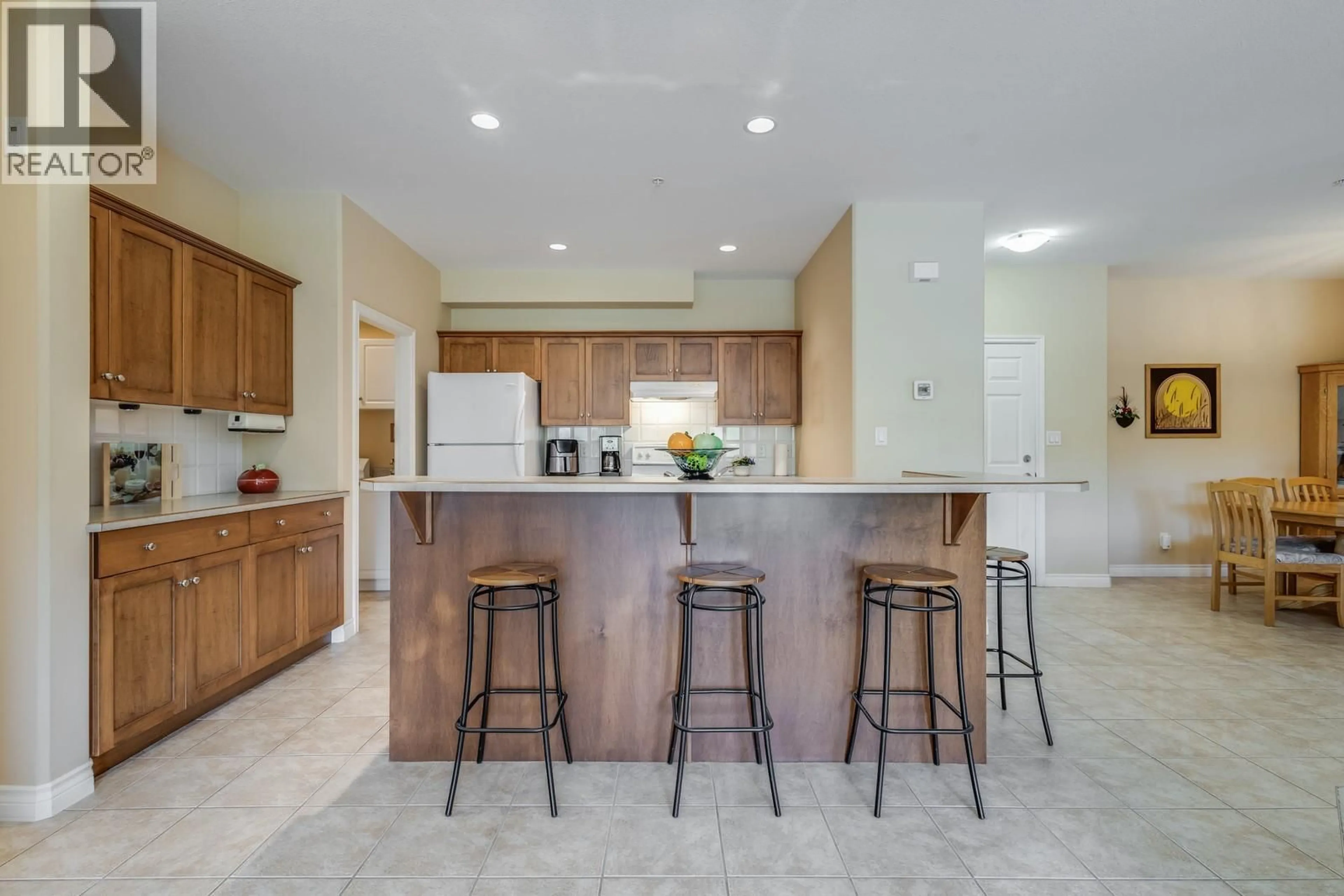 Open concept kitchen, ceramic/tile floor for 306 - 1961 DURNIN ROAD, Kelowna British Columbia V1X7Z6