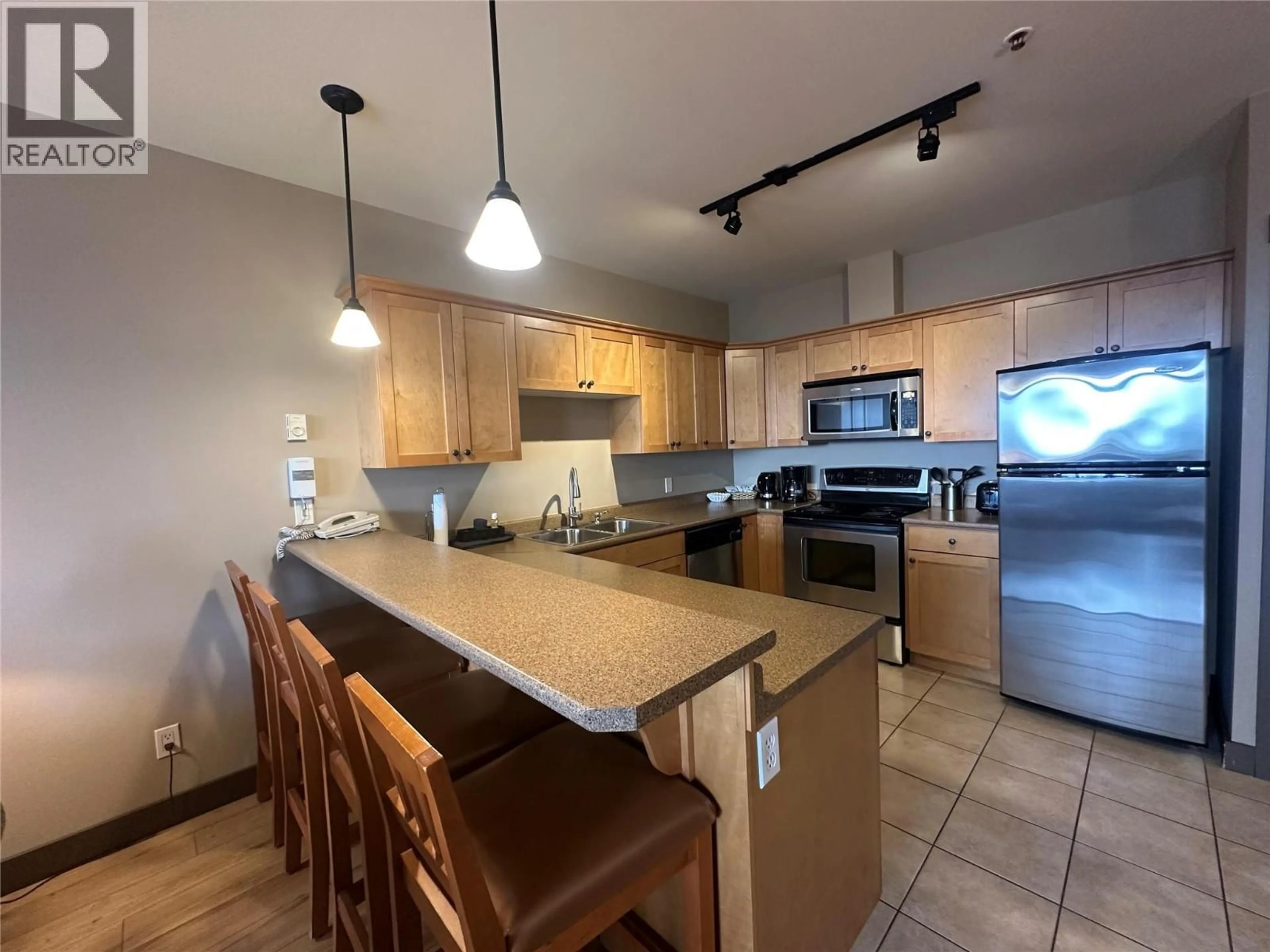 Open concept kitchen, unknown for 301 - 1420 PALLISER TRAIL, Golden British Columbia V0A1H2