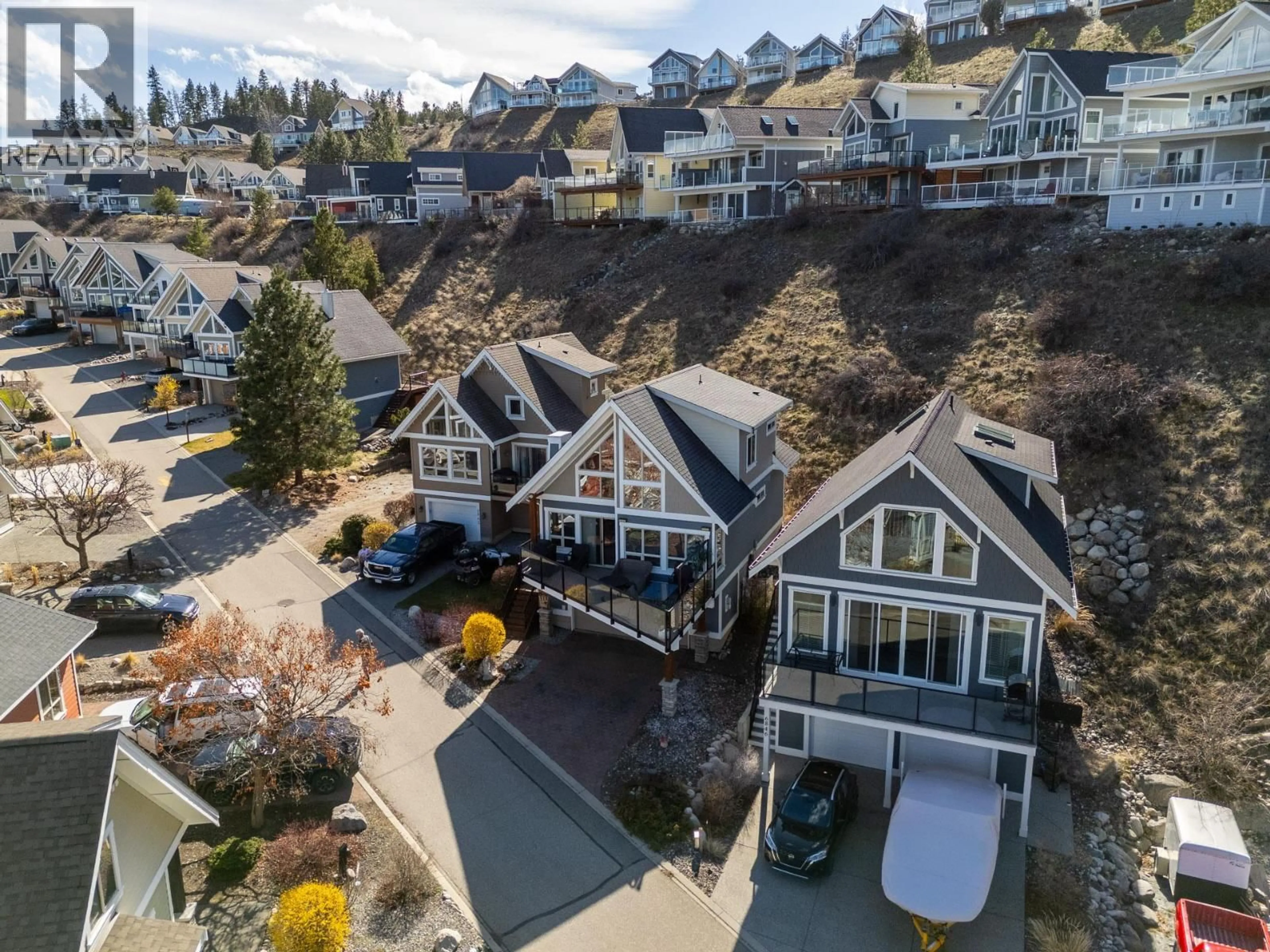 A pic from outside/outdoor area/front of a property/back of a property/a pic from drone, unknown for 6844 SANTIAGO LOOP, Kelowna British Columbia V1Z3R8
