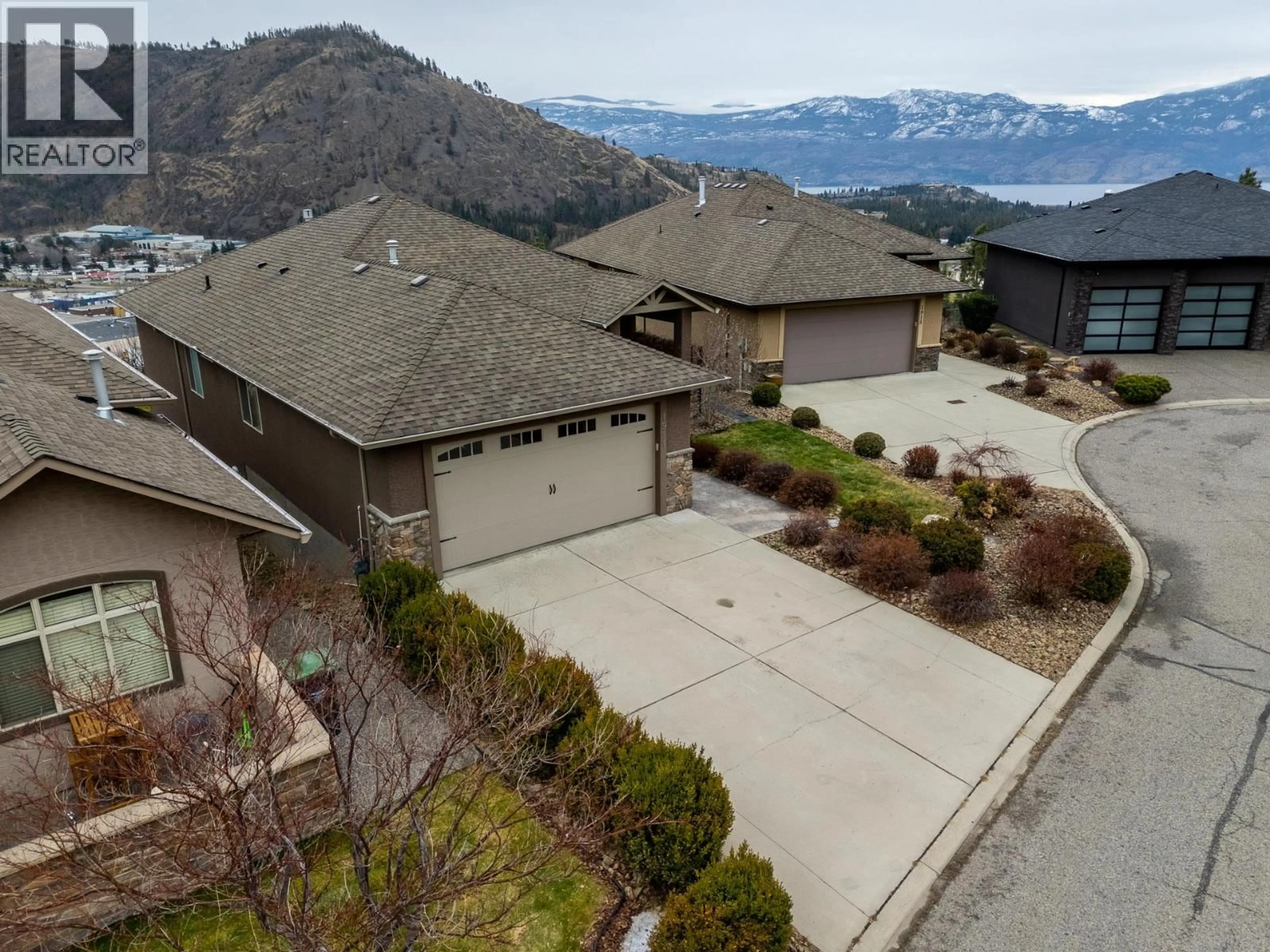 A pic from outside/outdoor area/front of a property/back of a property/a pic from drone, mountain view for 1911 CORNERSTONE DRIVE, West Kelowna British Columbia V4T2Y3
