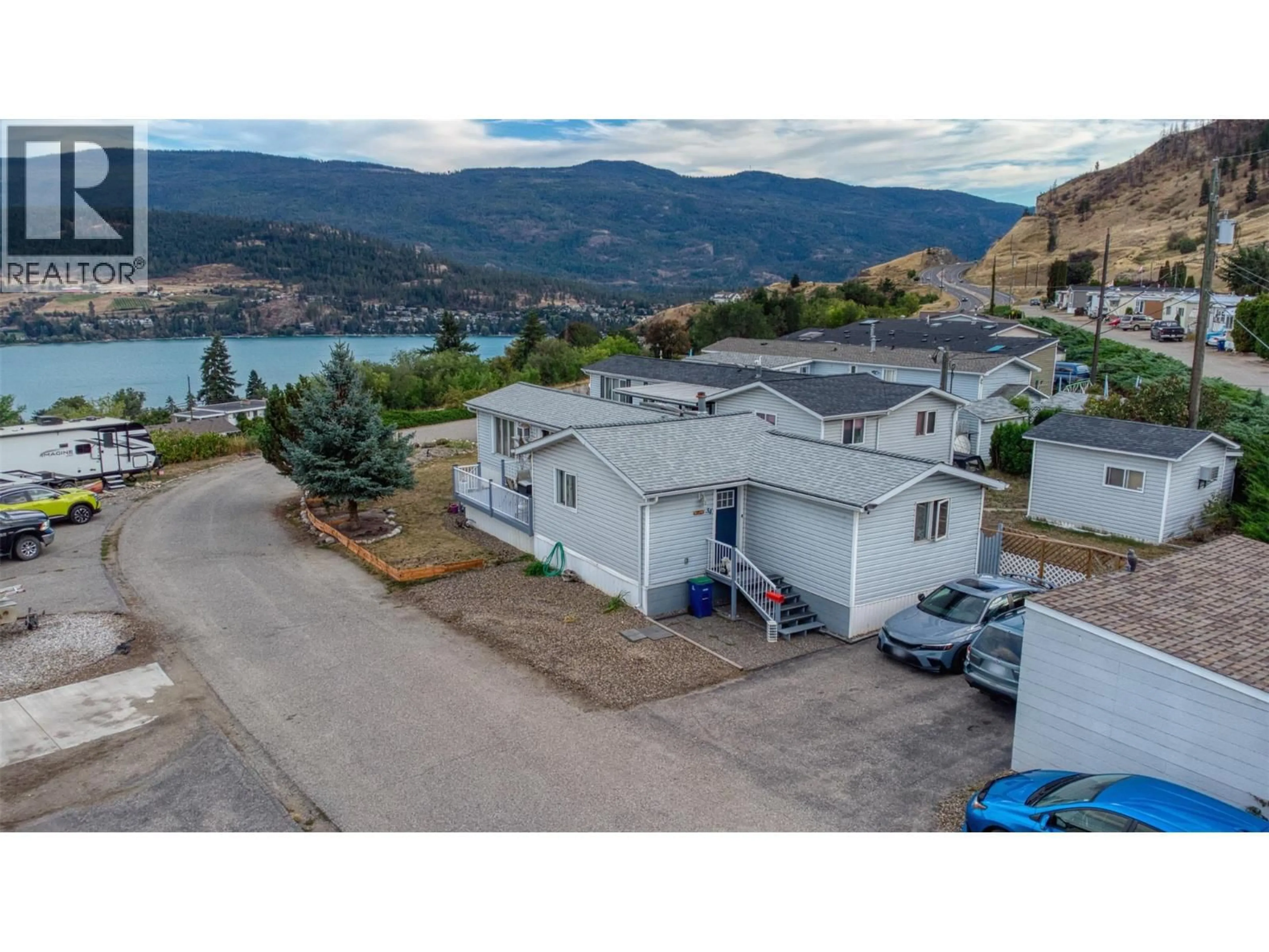 A pic from outside/outdoor area/front of a property/back of a property/a pic from drone, water/lake/river/ocean view for 34 - 8508 CLERKE ROAD, Coldstream British Columbia V1B1W2
