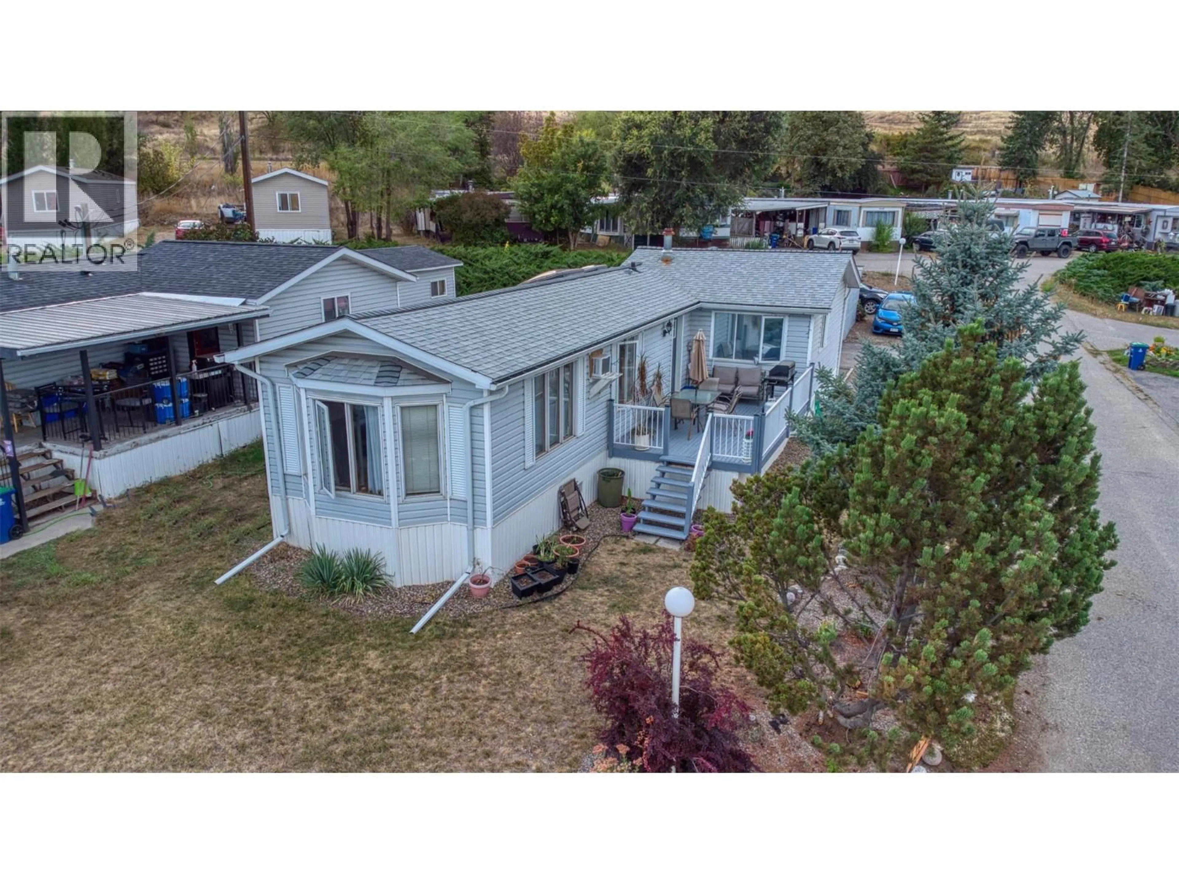 A pic from outside/outdoor area/front of a property/back of a property/a pic from drone, unknown for 34 - 8508 CLERKE ROAD, Coldstream British Columbia V1B1W2