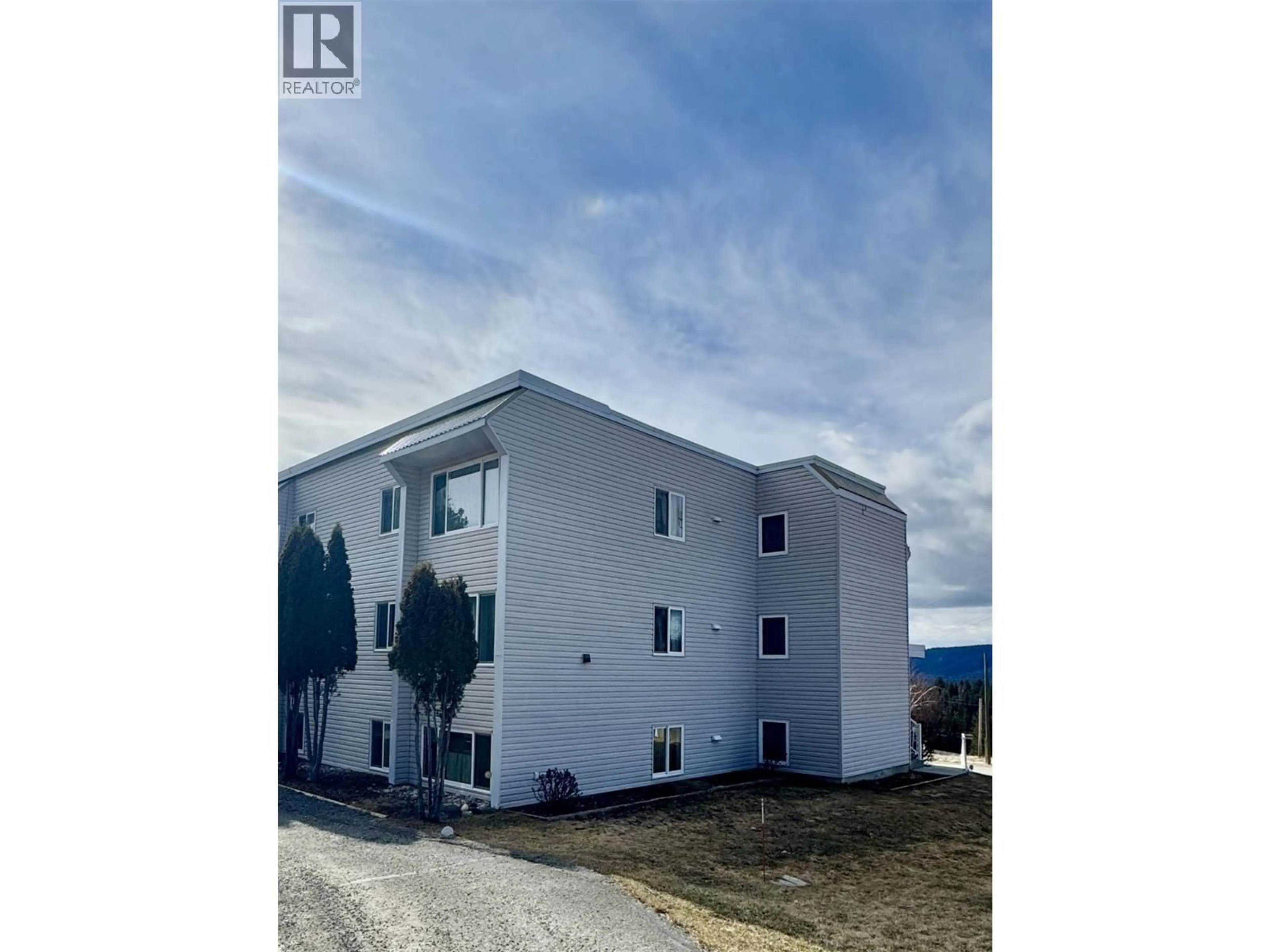 A pic from outside/outdoor area/front of a property/back of a property/a pic from drone, building for 201 - 400 OPAL DRIVE, Logan Lake British Columbia V0K1W0