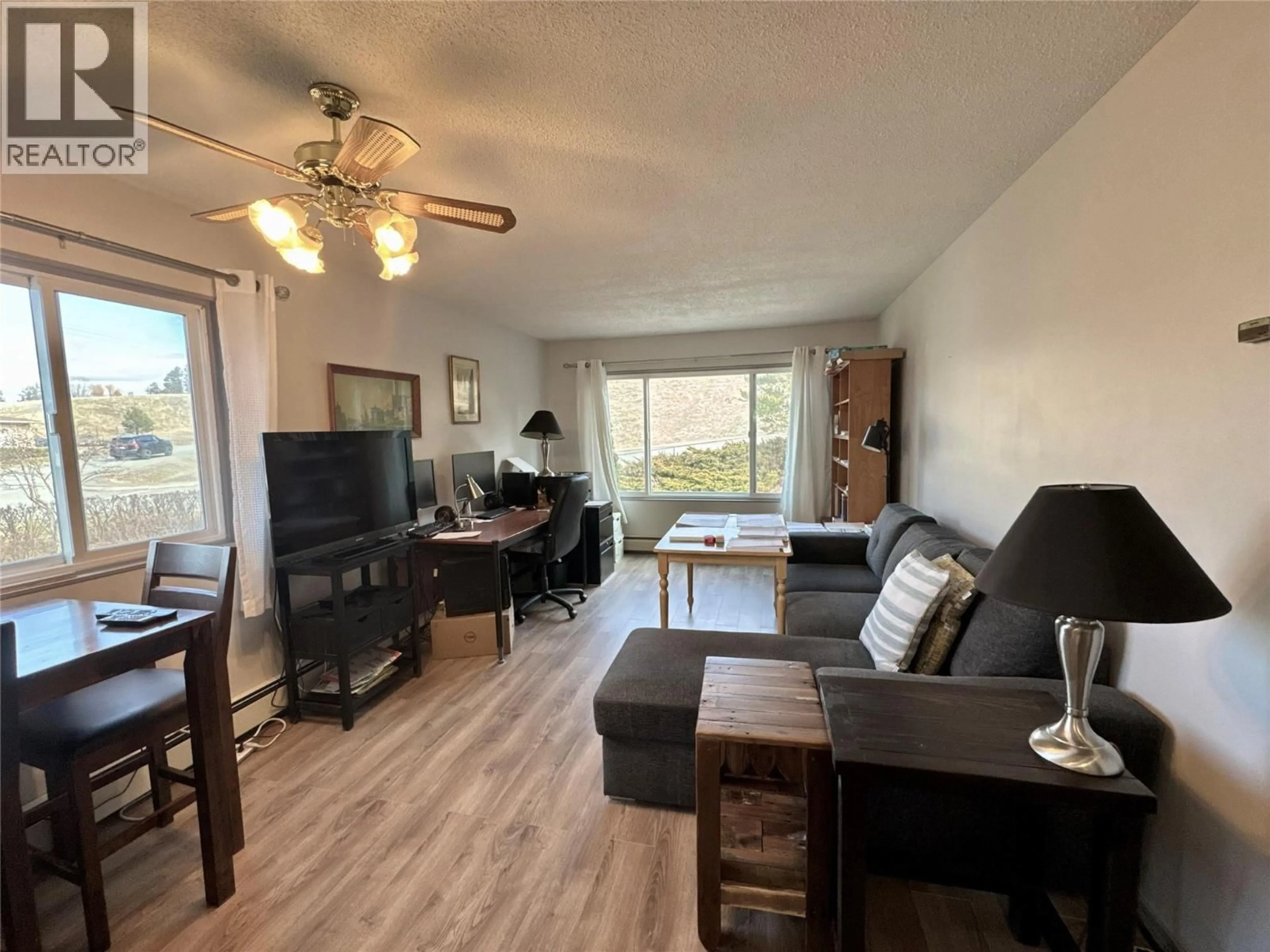 Living room with furniture, wood/laminate floor for 201 - 400 OPAL DRIVE, Logan Lake British Columbia V0K1W0