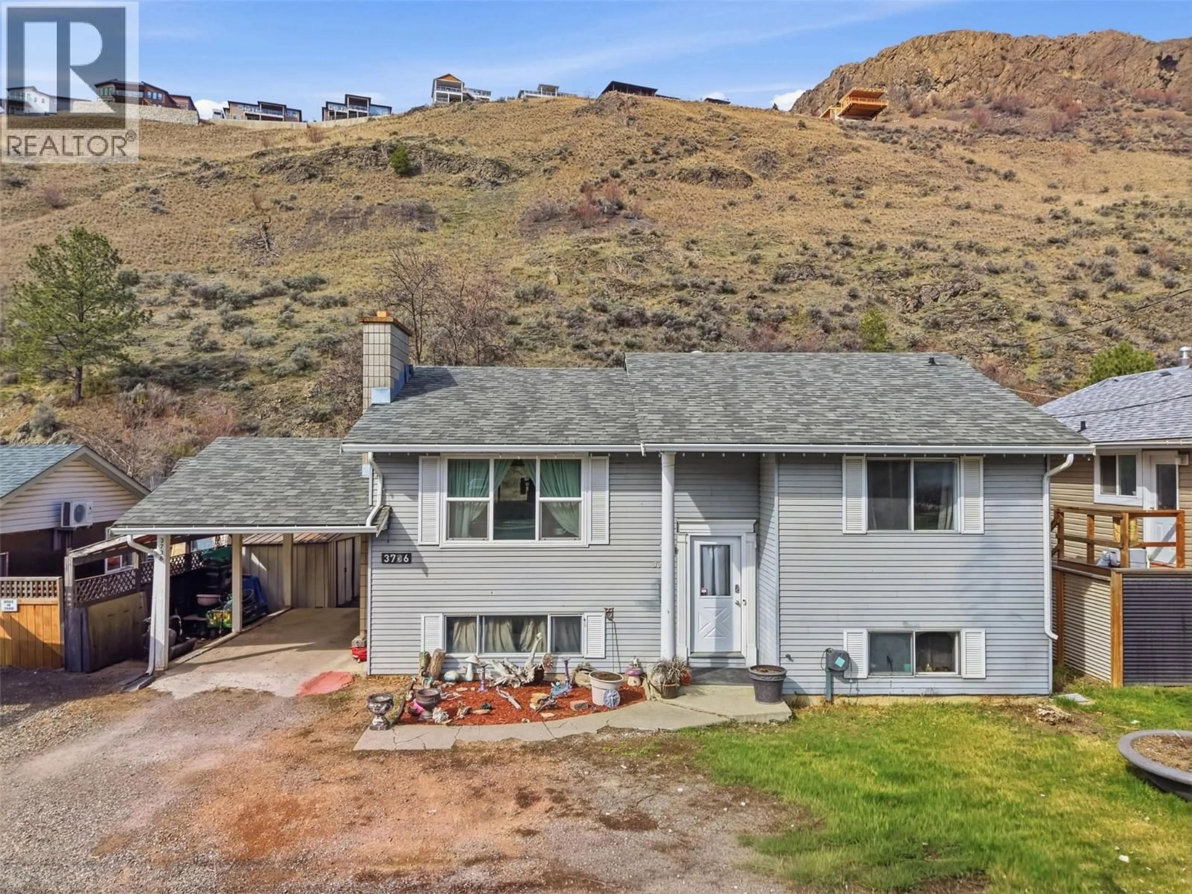 A pic from outside/outdoor area/front of a property/back of a property/a pic from drone, mountain view for 3736 WESTSYDE ROAD, Kamloops British Columbia V2B7H6
