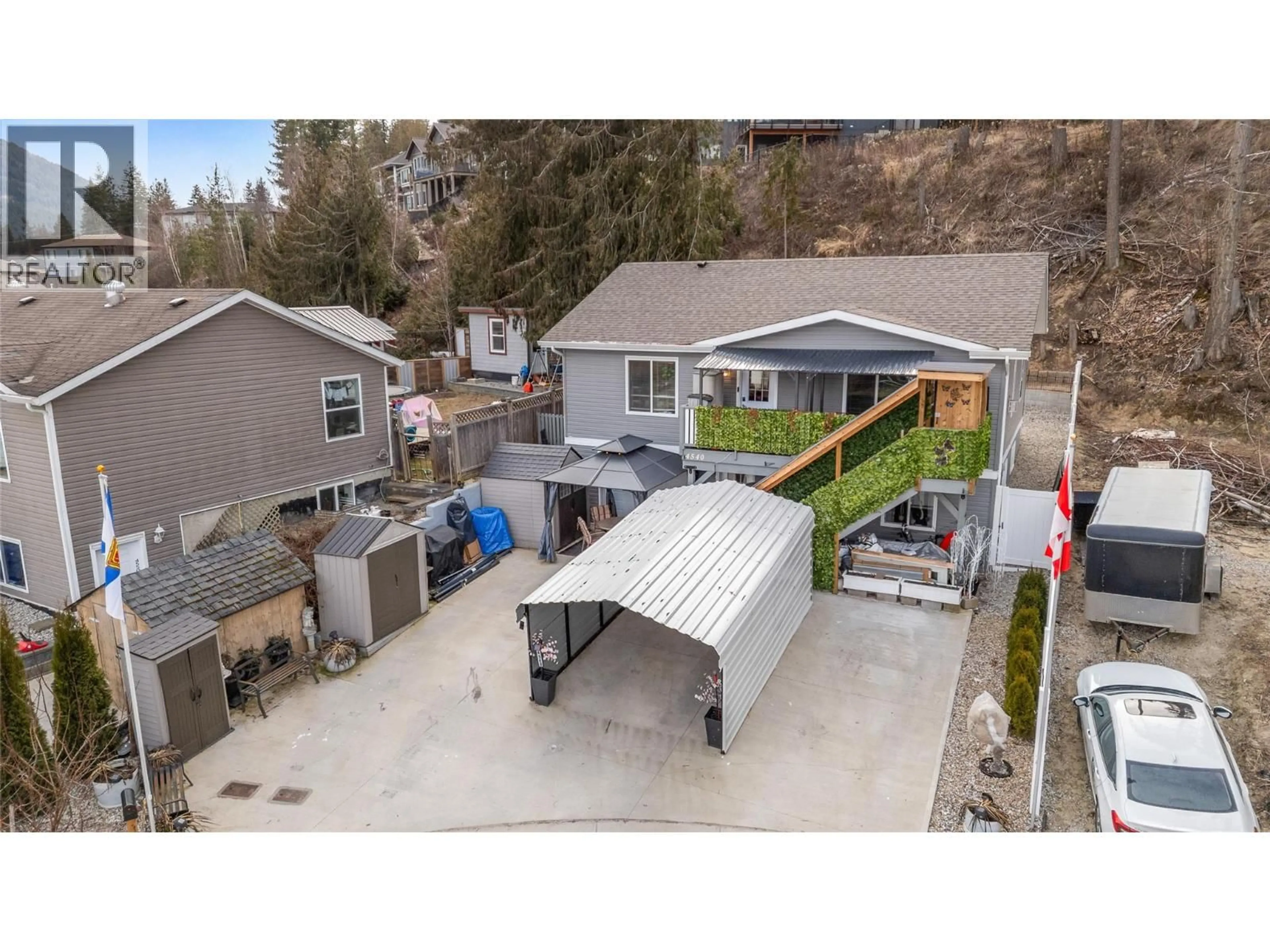 A pic from outside/outdoor area/front of a property/back of a property/a pic from drone, street for 4540 72 AVENUE NORTHEAST, Canoe British Columbia V0E1K0