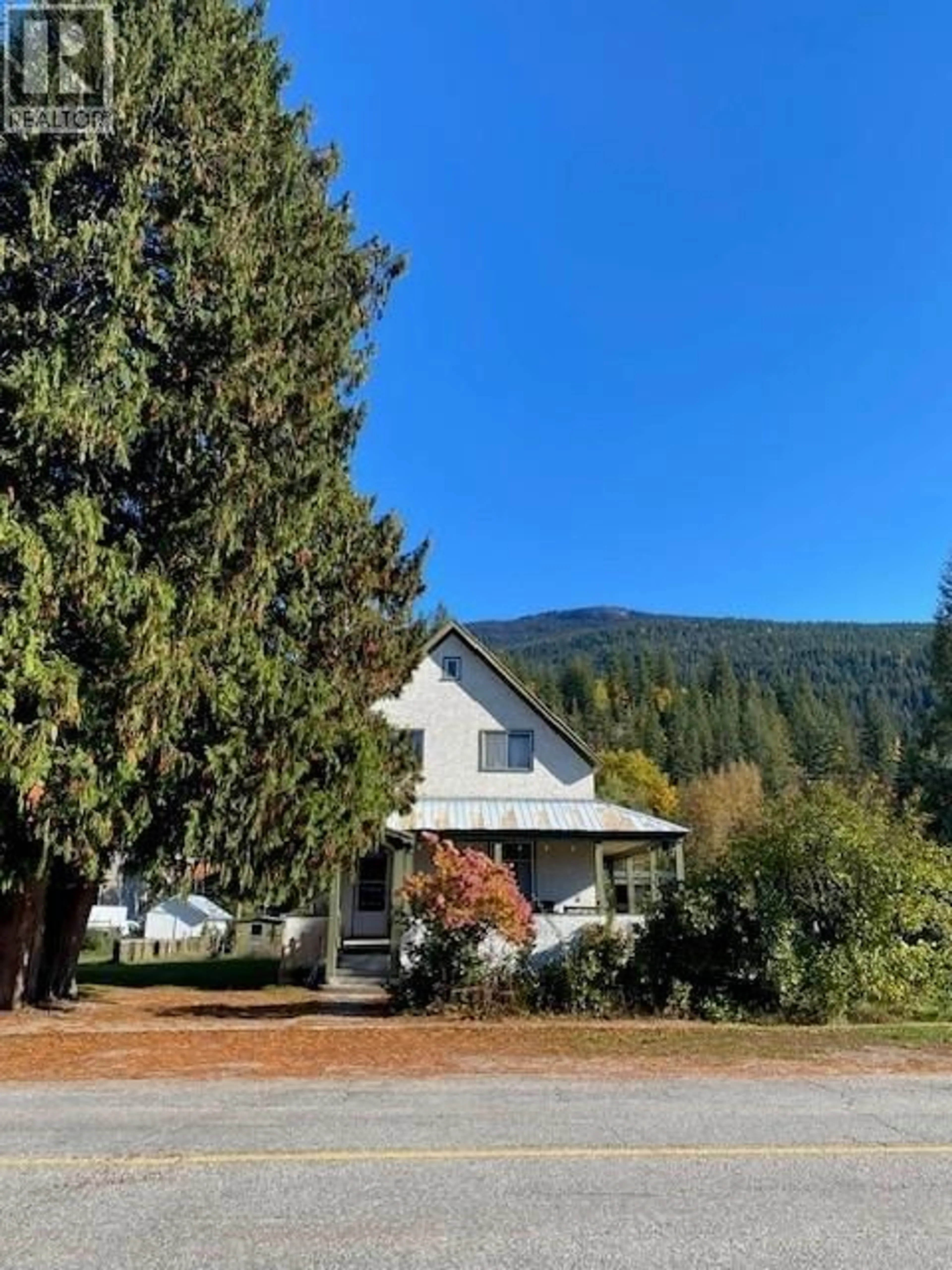 A pic from outside/outdoor area/front of a property/back of a property/a pic from drone, mountain view for 1202 FIRST STREET, Revelstoke British Columbia V0E2S0