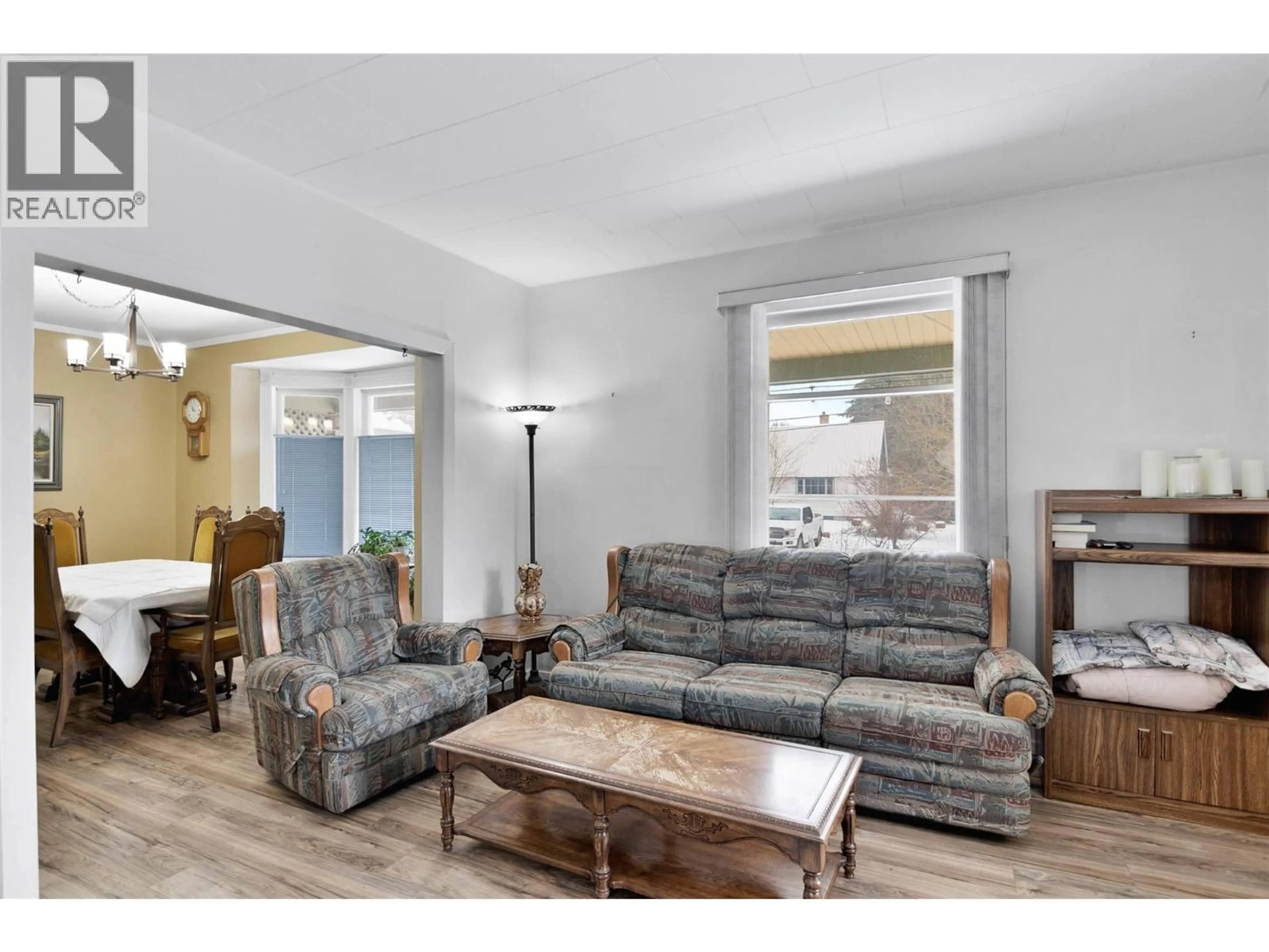 Living room with furniture, wood/laminate floor for 1202 FIRST STREET, Revelstoke British Columbia V0E2S0