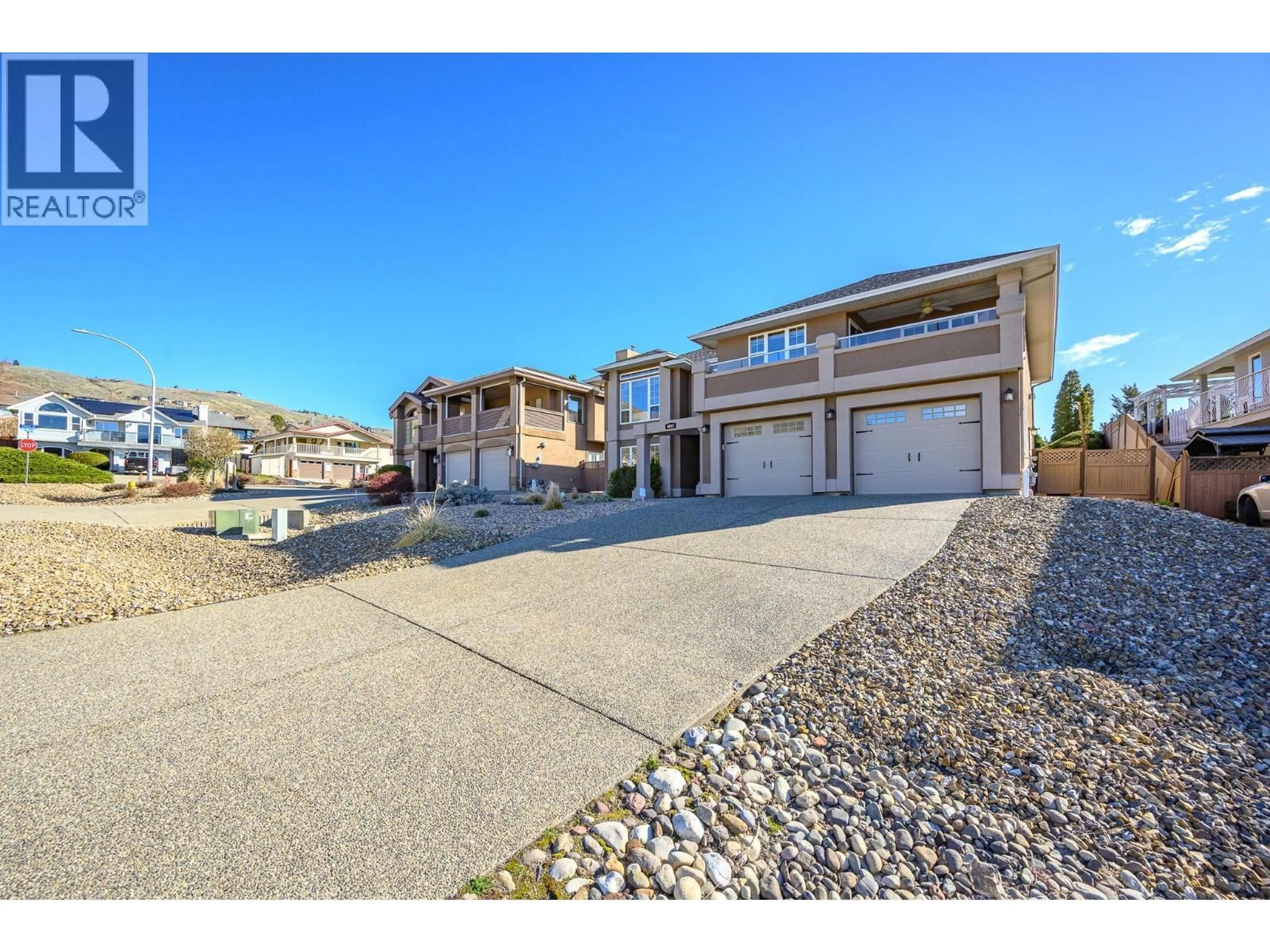 A pic from outside/outdoor area/front of a property/back of a property/a pic from drone, street for 6845 CAMEO DRIVE NORTH, Vernon British Columbia V1H1N9