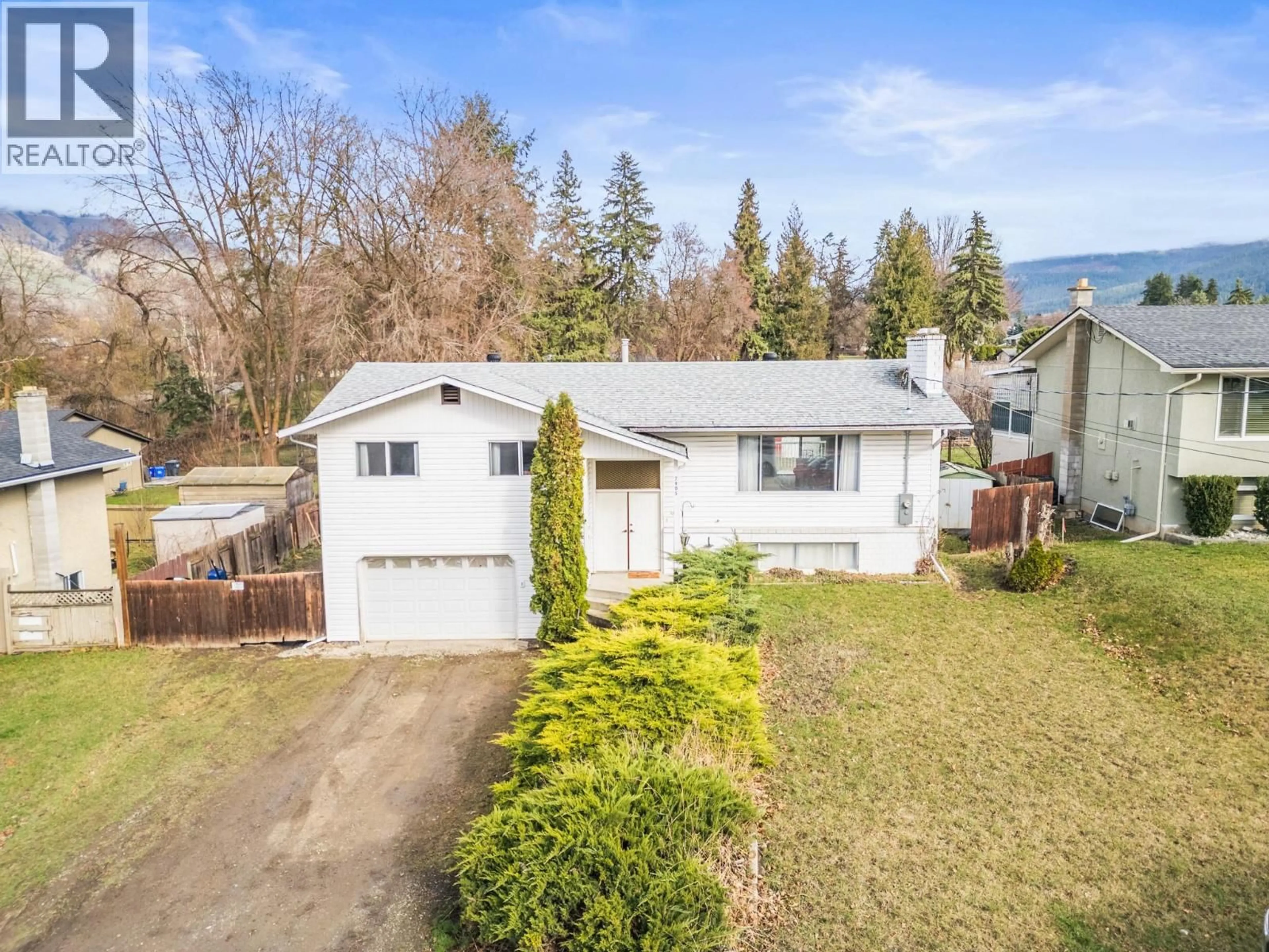 A pic from outside/outdoor area/front of a property/back of a property/a pic from drone, street for 7905 GILES ROAD, Coldstream British Columbia V1B1G6