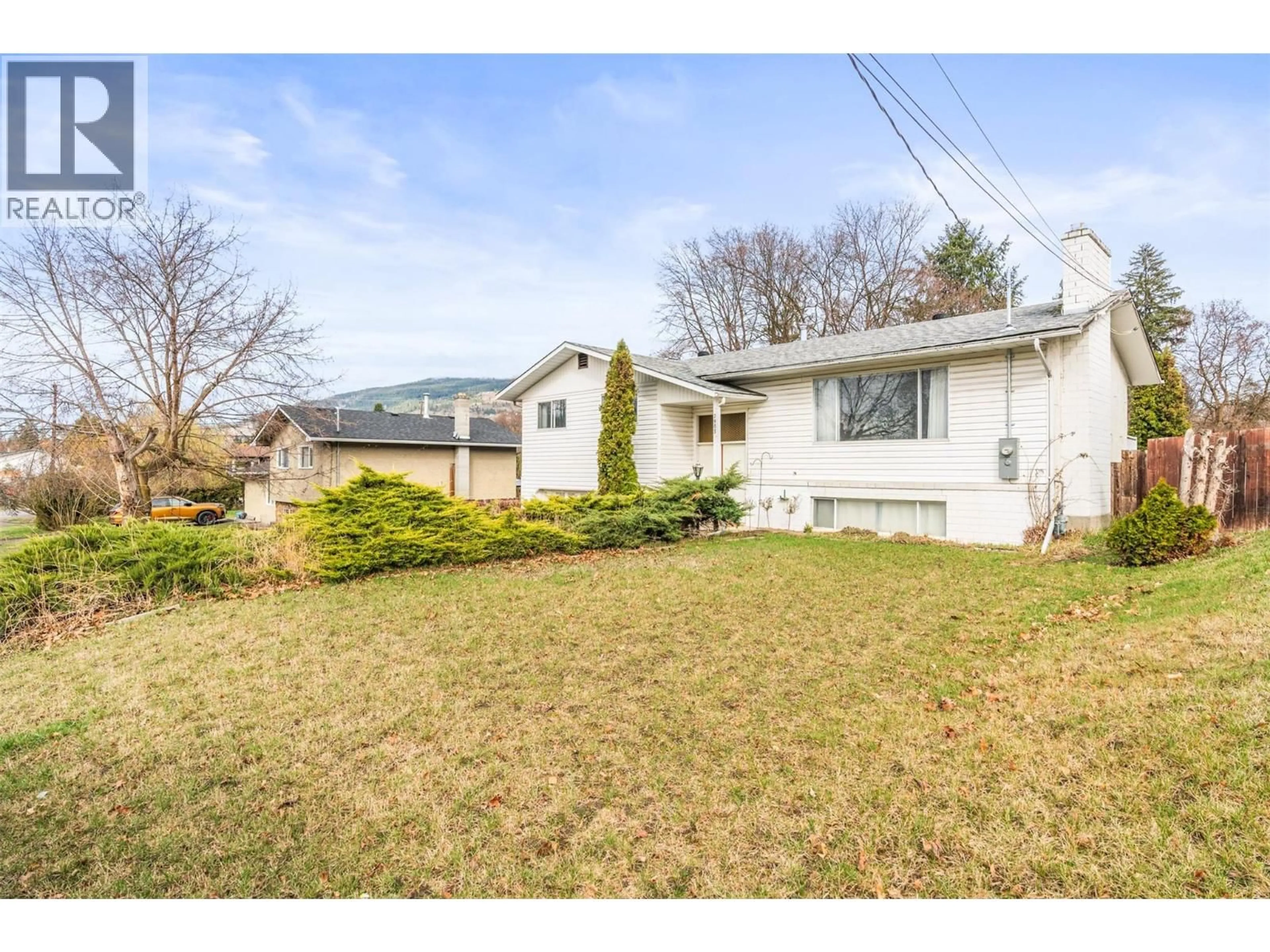 A pic from outside/outdoor area/front of a property/back of a property/a pic from drone, street for 7905 GILES ROAD, Coldstream British Columbia V1B1G6